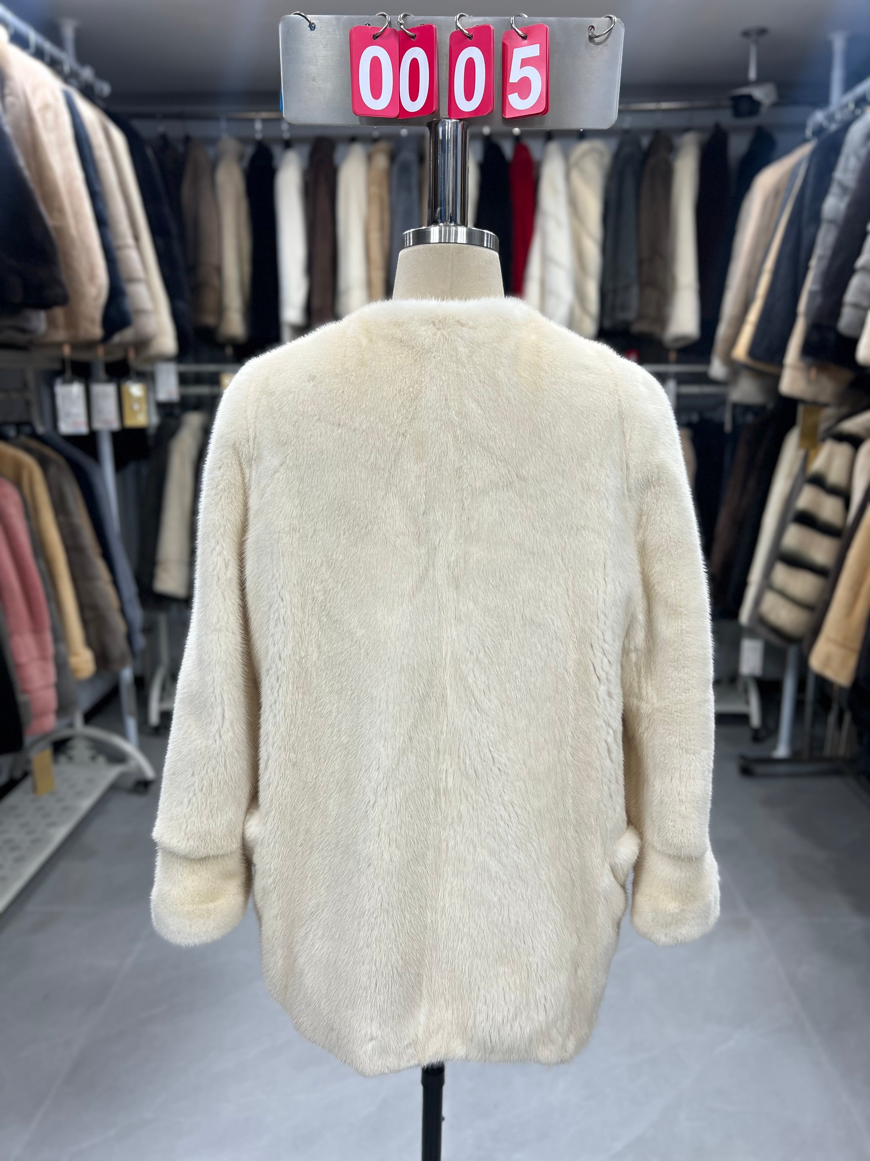 White velvet-finish mink coat with a round-neck design.005