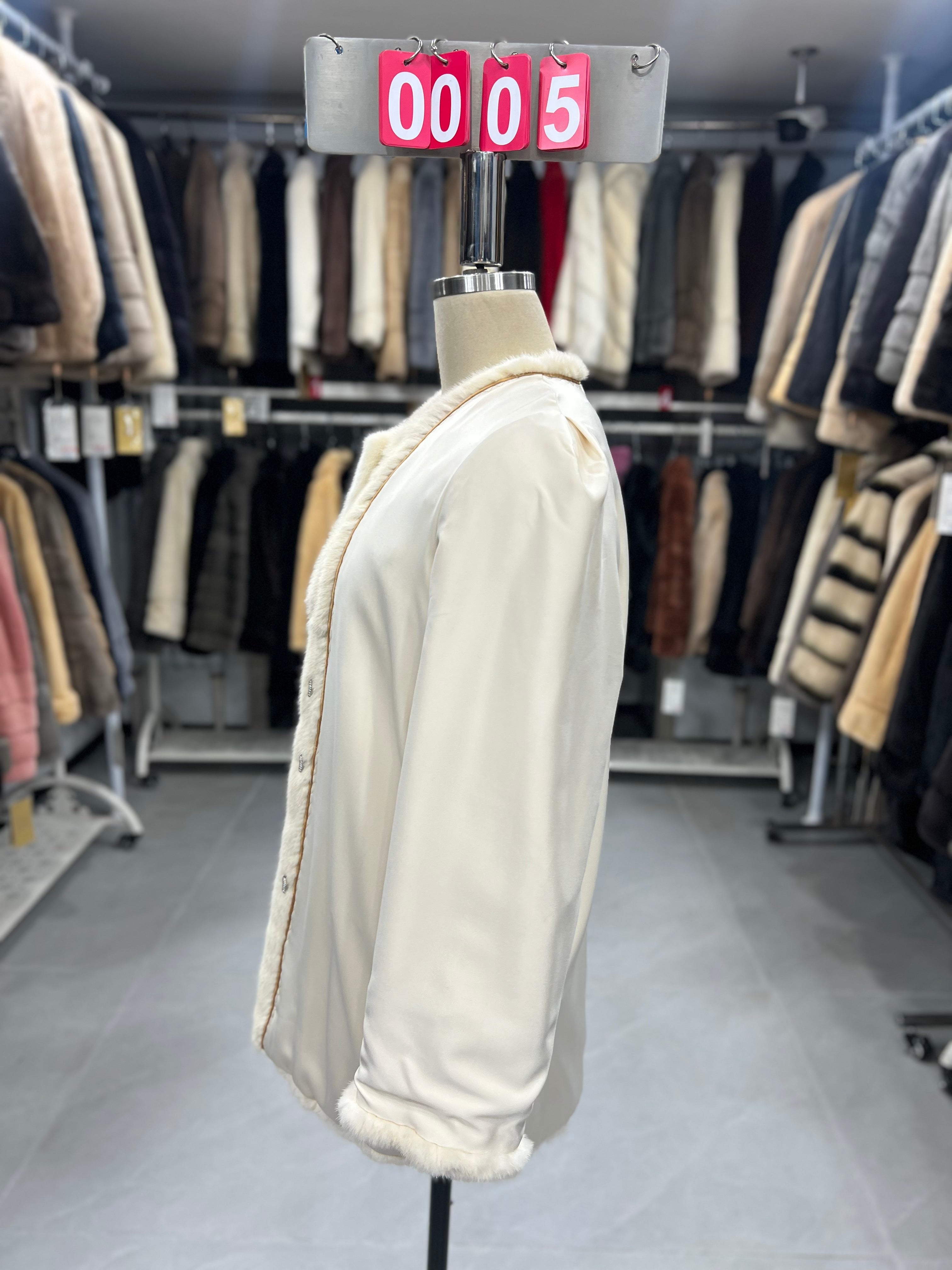 White velvet-finish mink coat with a round-neck design.005