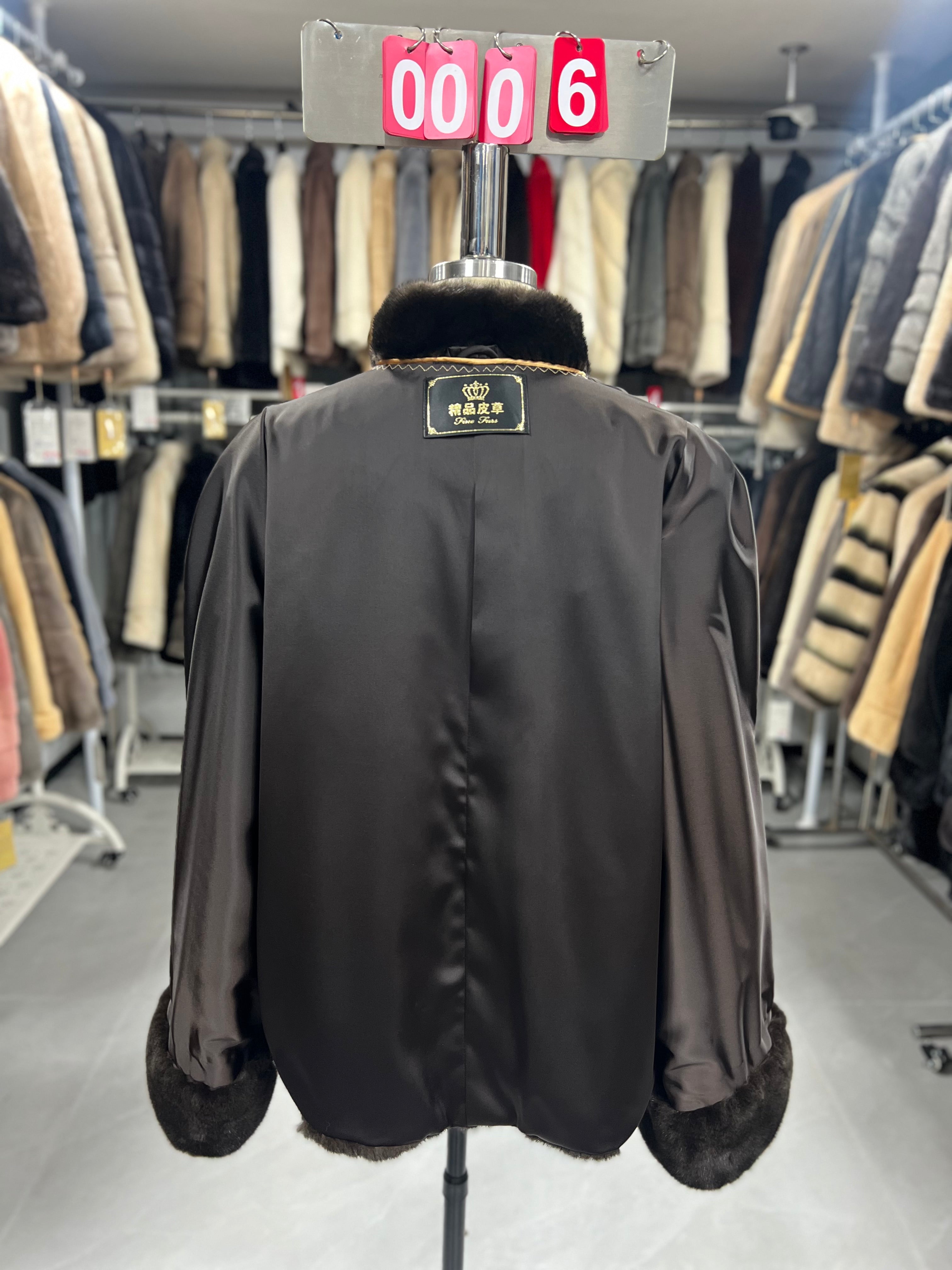 Brown velvet-finish mink coat featuring a stand collar, diagonal buttoning, and roll-up sleeves.006