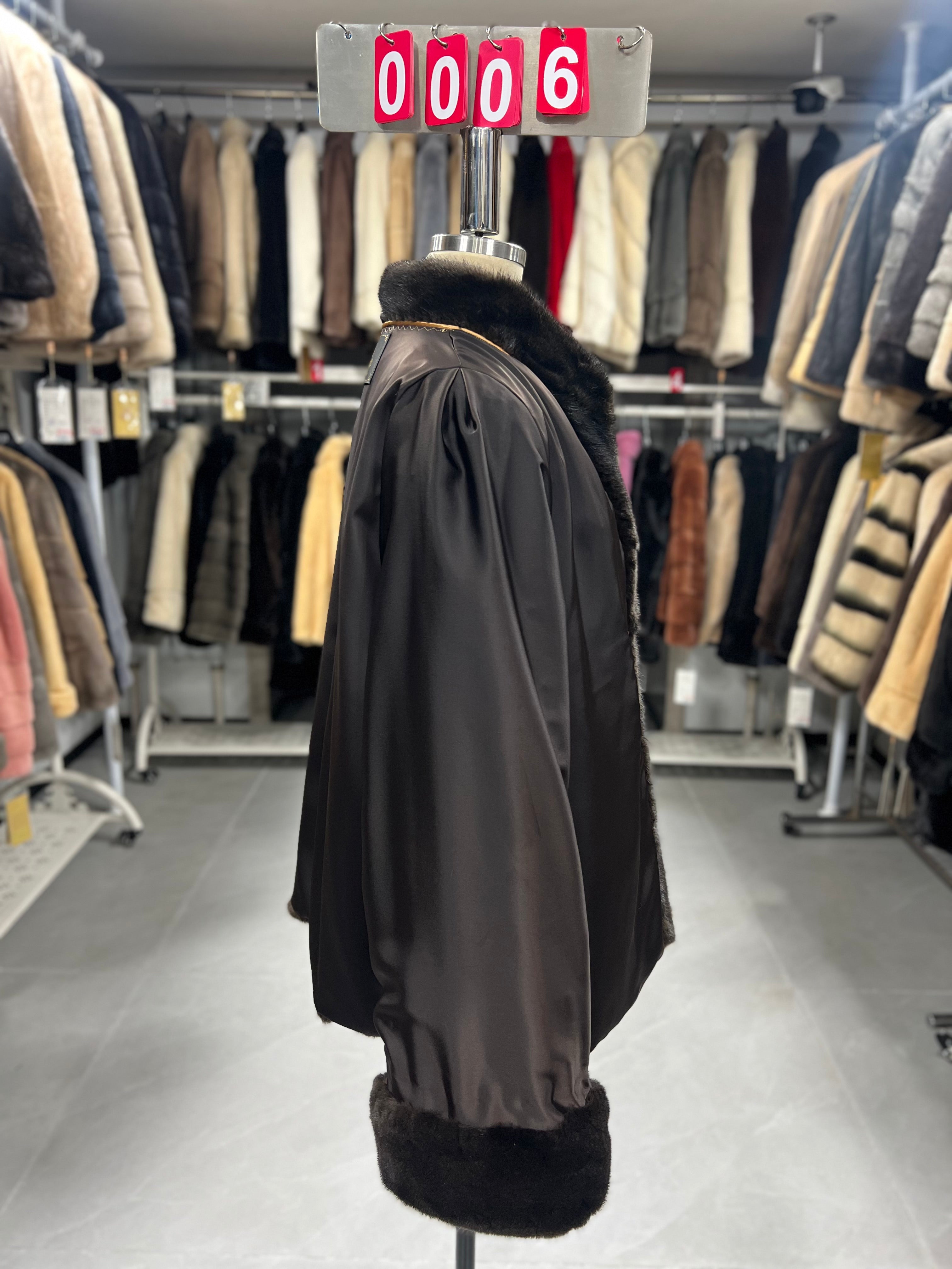 Brown velvet-finish mink coat featuring a stand collar, diagonal buttoning, and roll-up sleeves.006