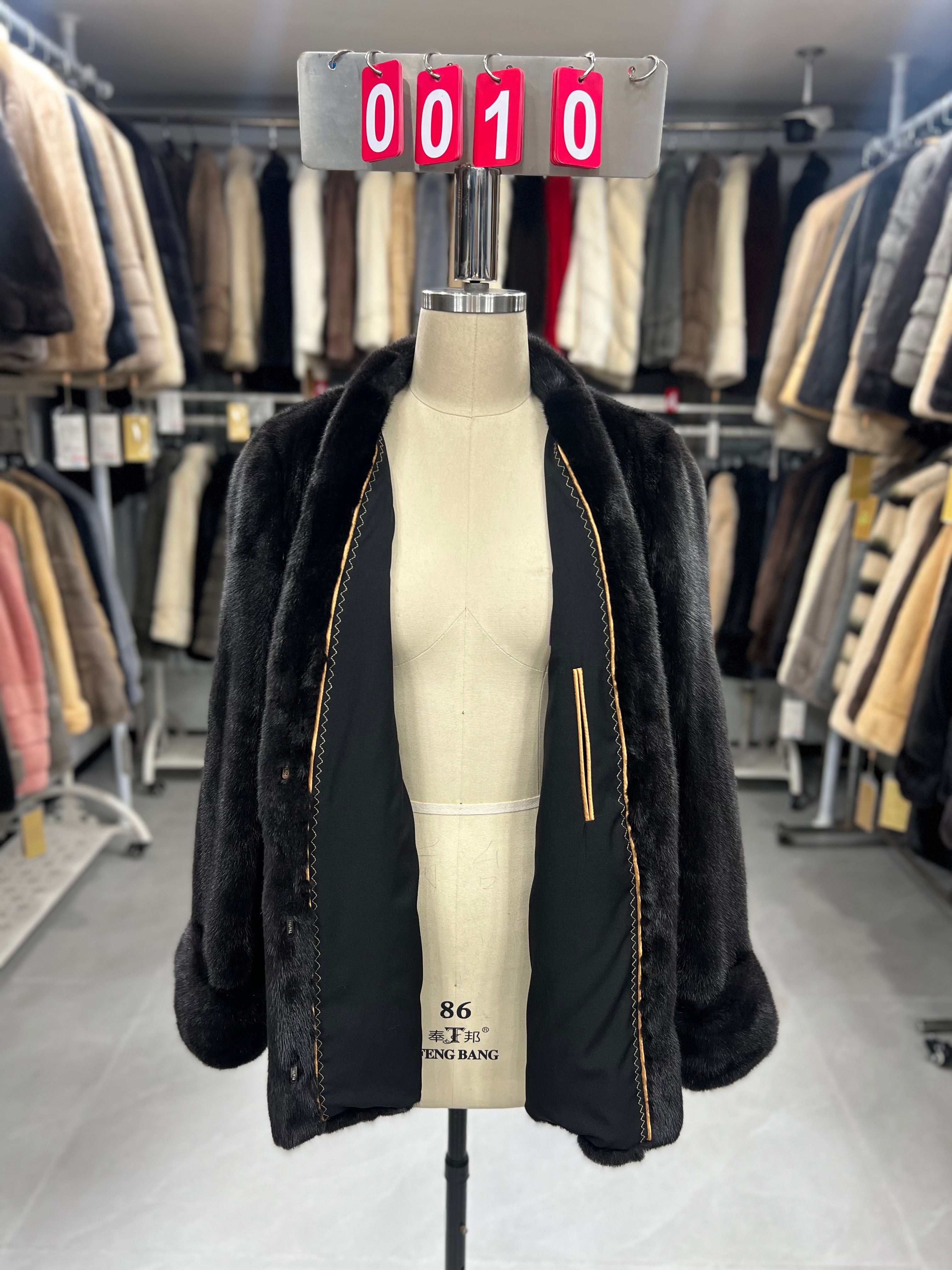 Dark brown V-neck velvet-finish mink coat with roll-up sleeves.010
