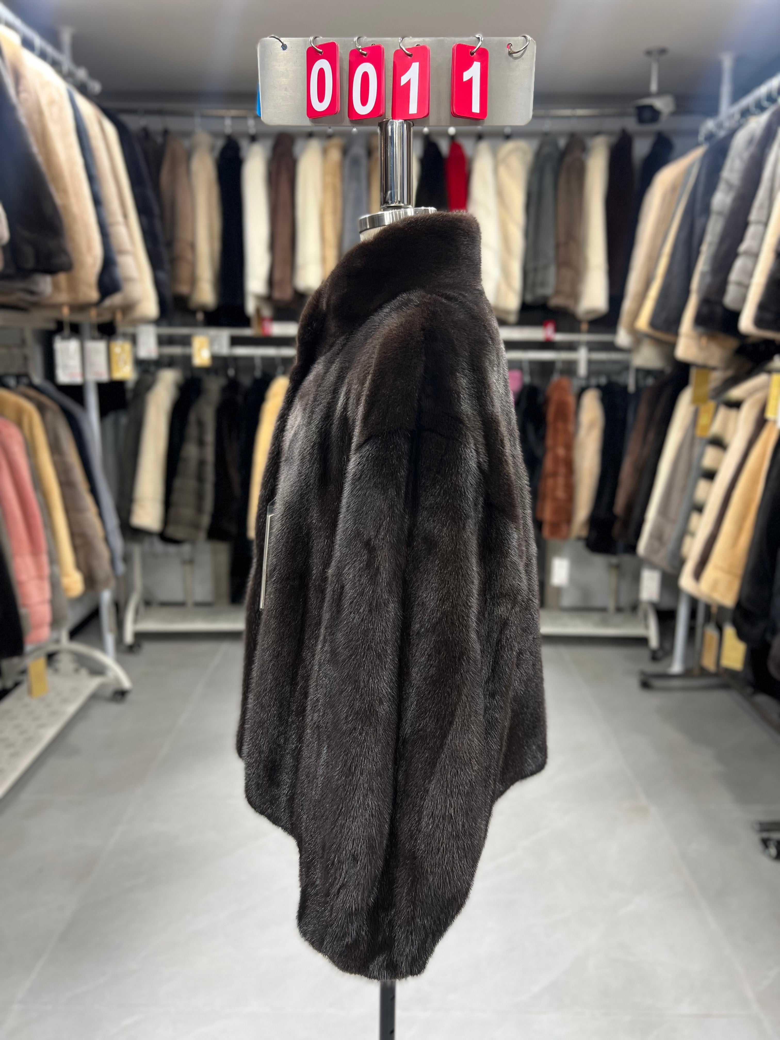 Dark brown velvet-finish mink coat featuring a stand-up collar and fitted cuffs.011