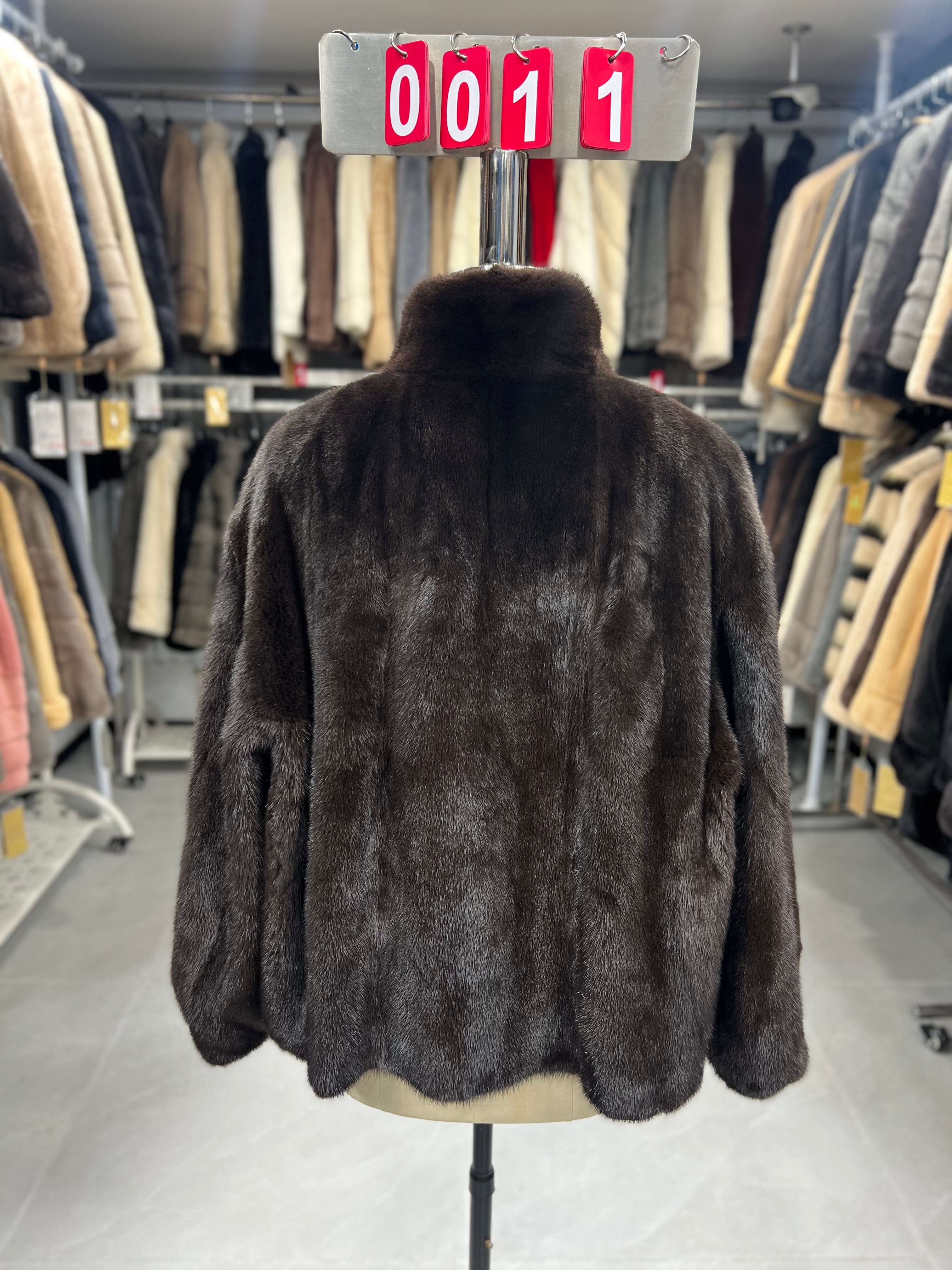 Dark brown velvet-finish mink coat featuring a stand-up collar and fitted cuffs.011