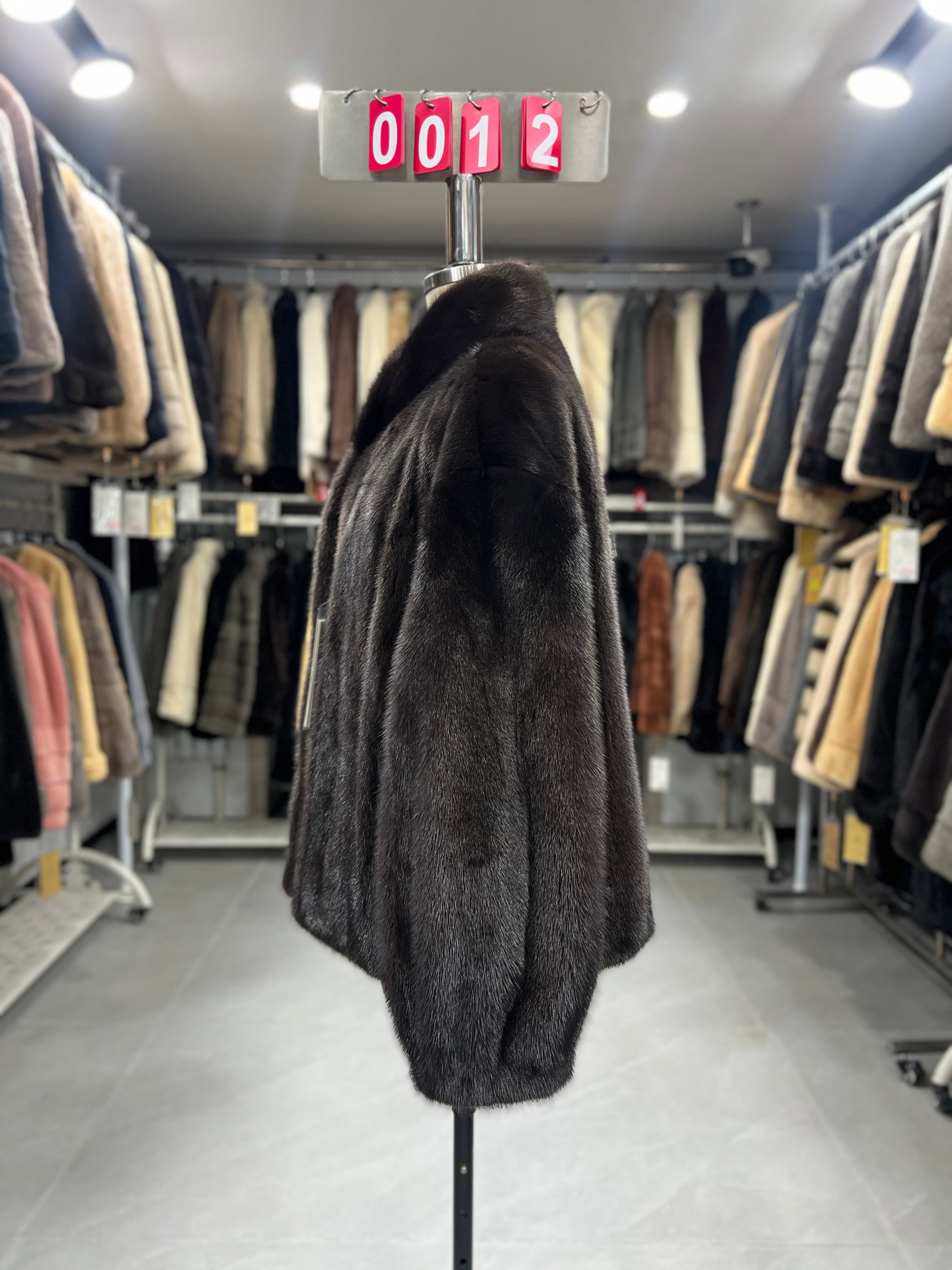 Dark brown velvet-finish mink coat featuring a stand-up collar and fitted cuffs.012