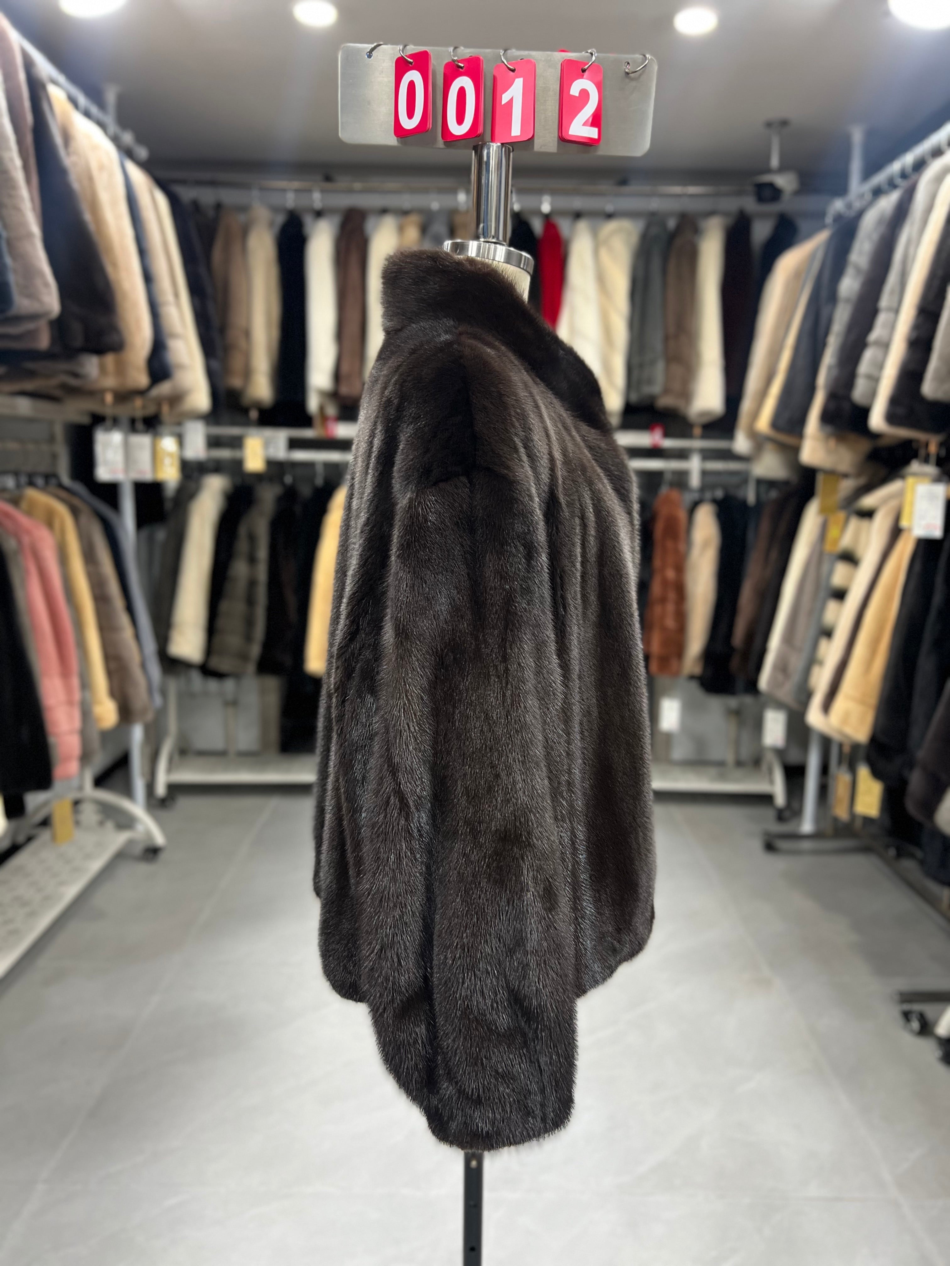 Dark brown velvet-finish mink coat featuring a stand-up collar and fitted cuffs.012