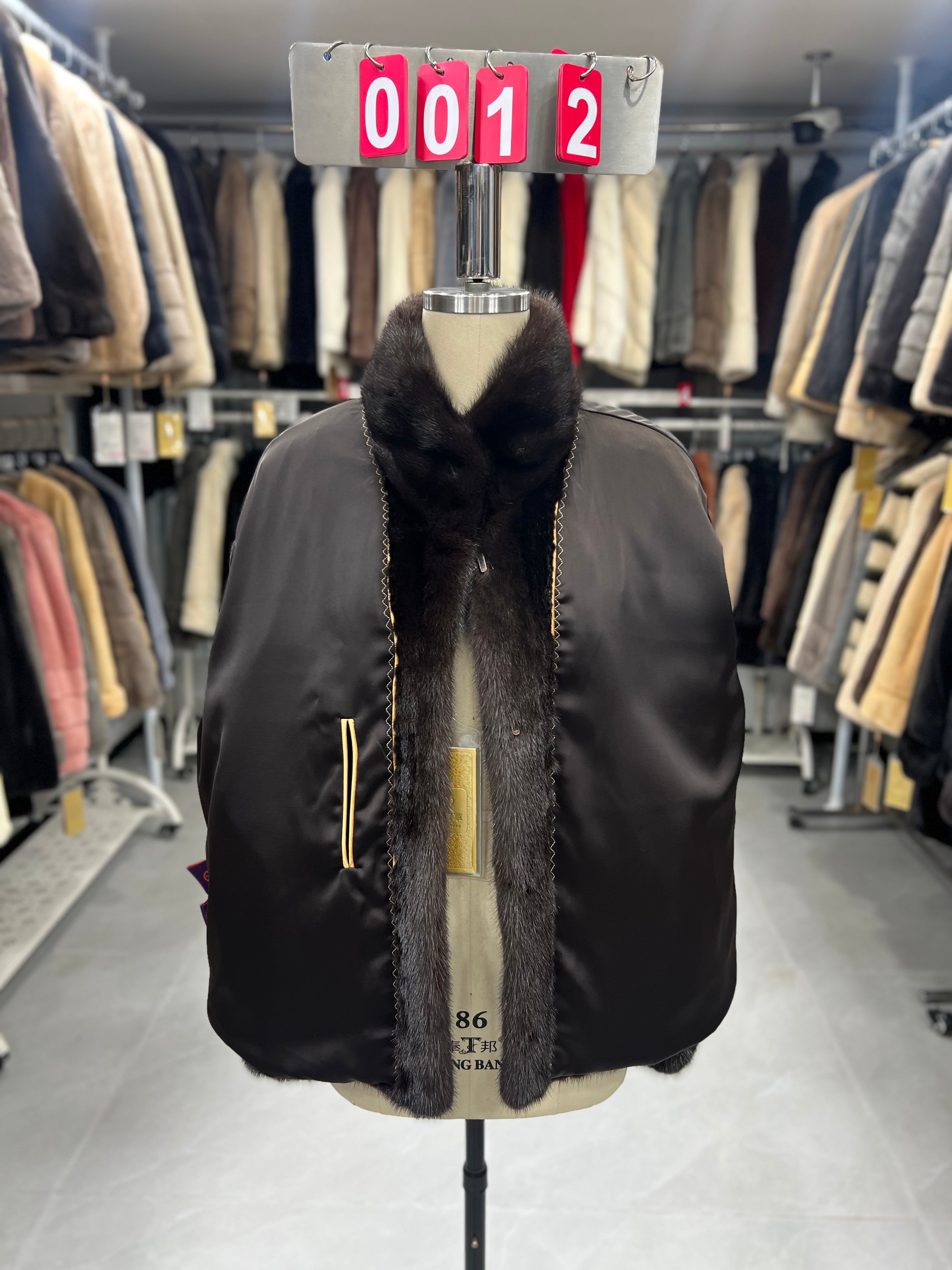 Dark brown velvet-finish mink coat featuring a stand-up collar and fitted cuffs.012