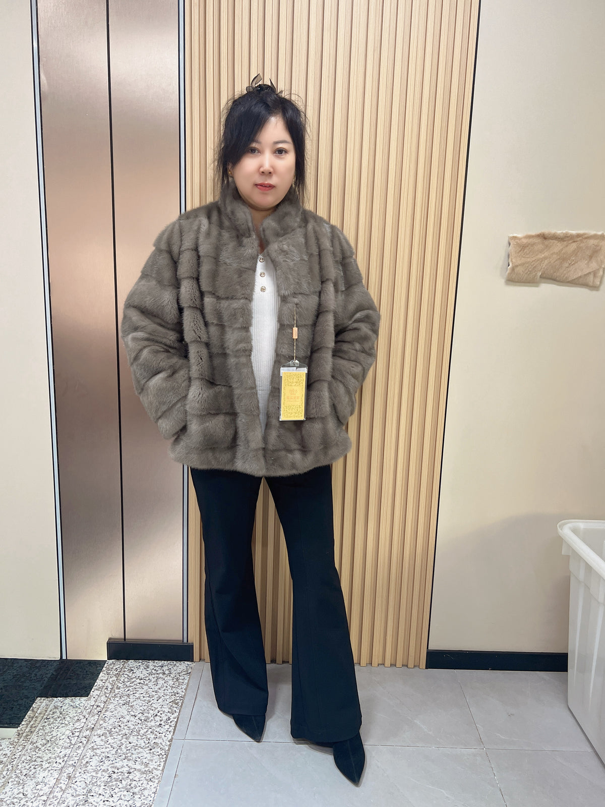 No. 160: Grey stand-collar mink fur coat featuring a horizontal panel design.