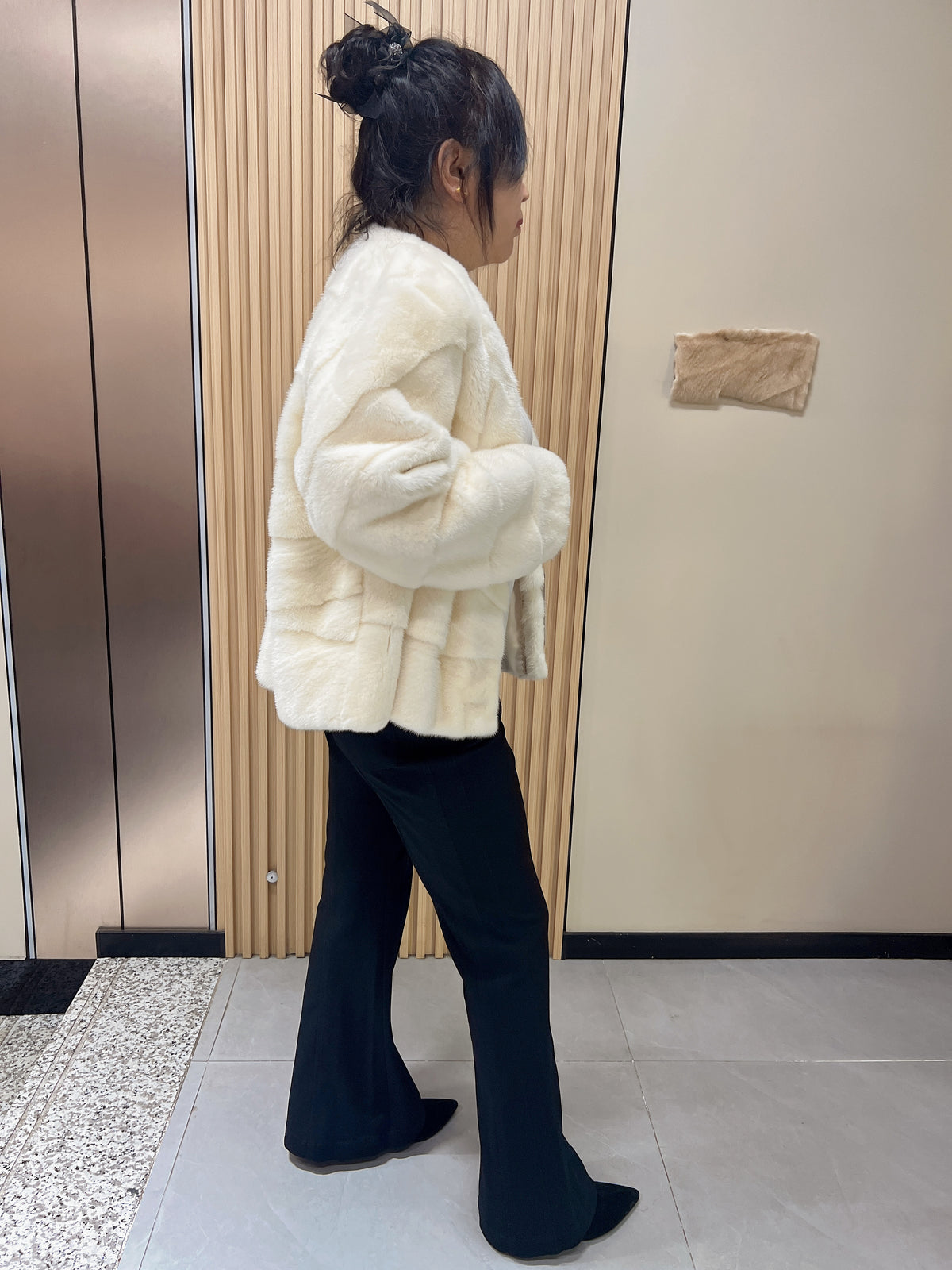 No. 153 Off-white V-neck mink fur coat featuring diagonal detailing.