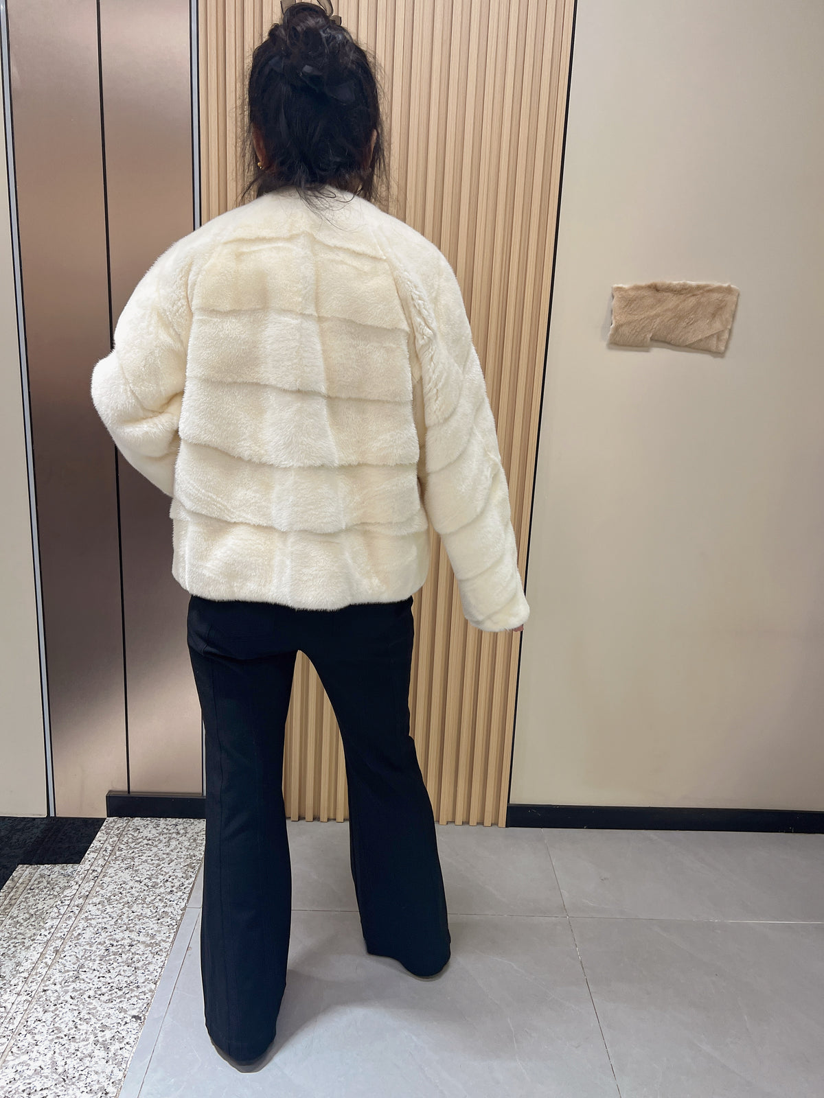 No. 153 Off-white V-neck mink fur coat featuring diagonal detailing.