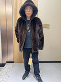 No. 126 Men's dark brown hooded mink coat with front zip closure.