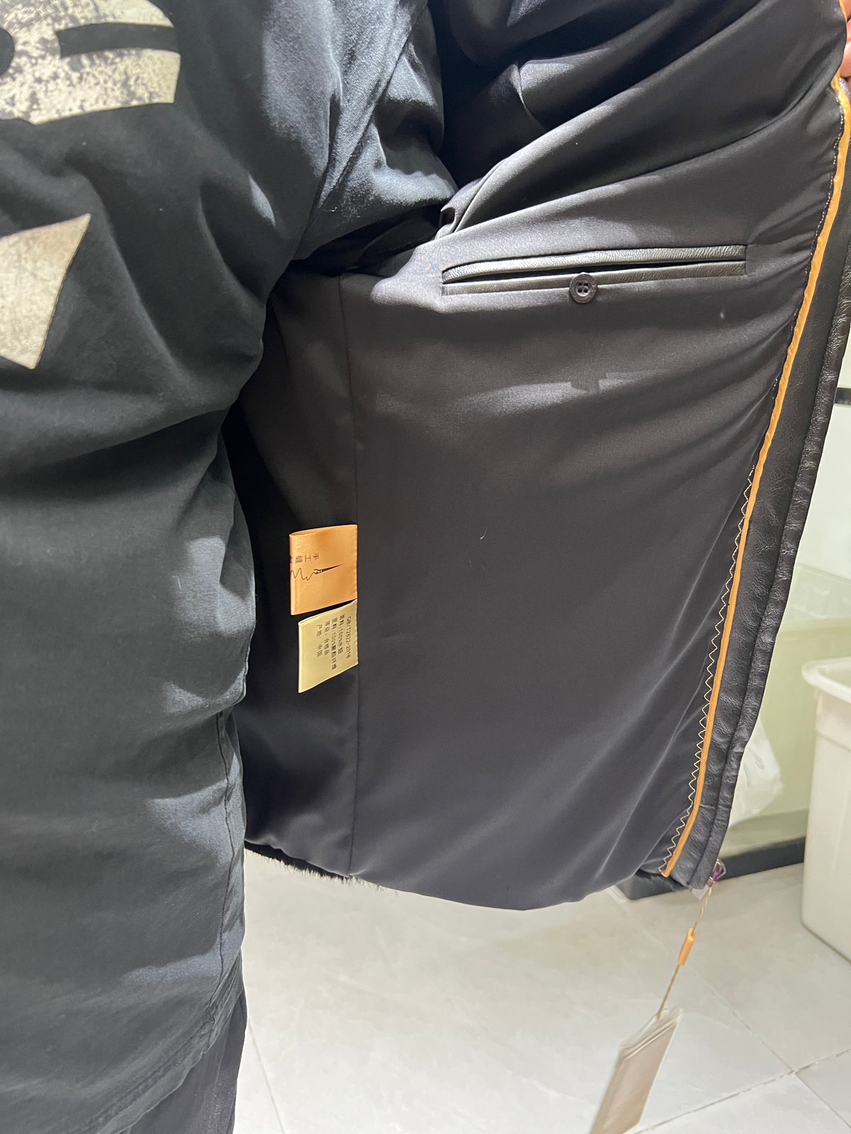 No. 130 Men's black mink coat featuring a lapel collar and zip closure.