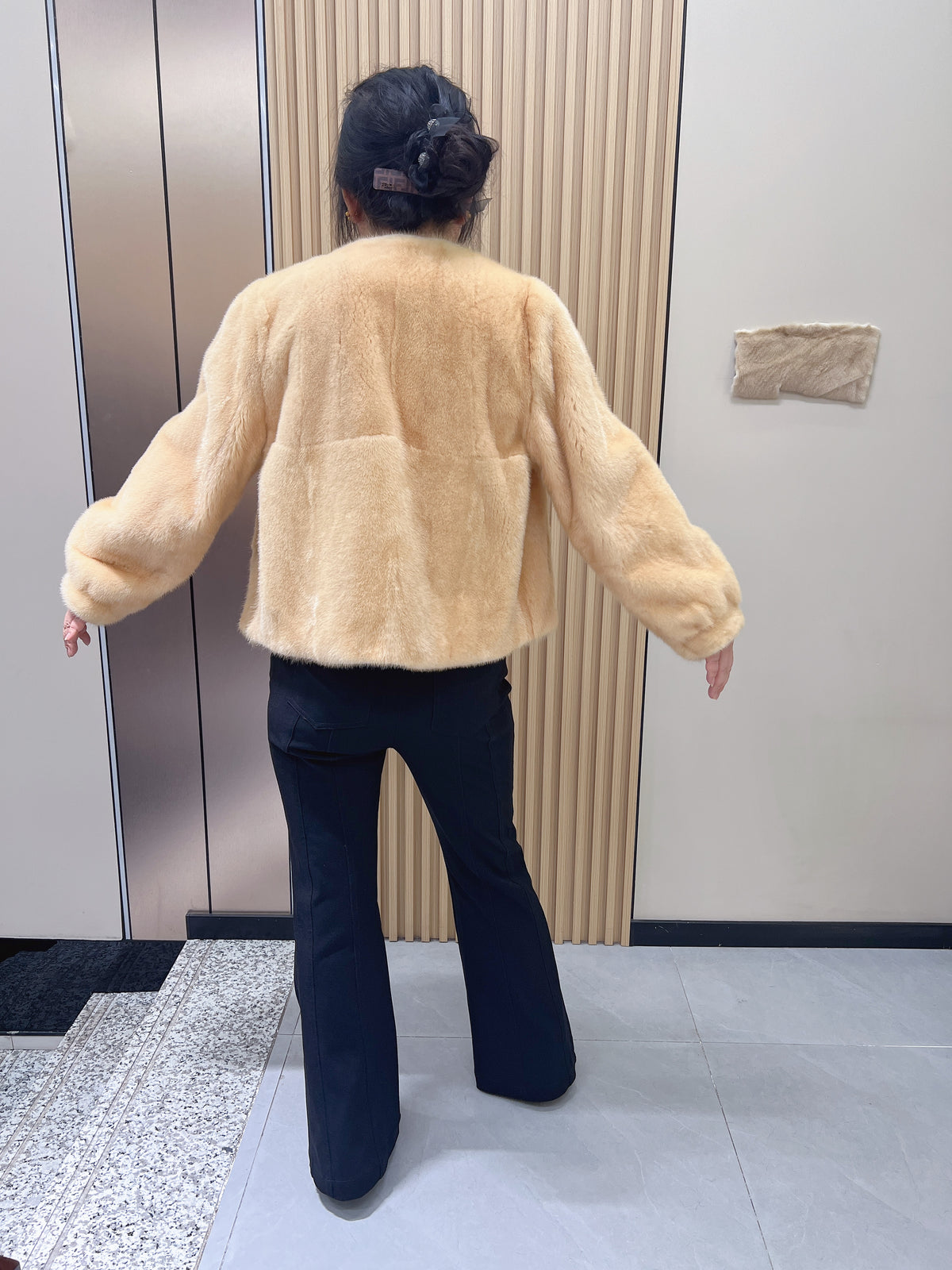 No. 187 light golden mink fur coat, featuring a collarless design.