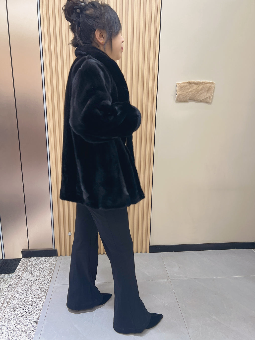 No. 217 black mink fur coat with a convertible stand-up collar.