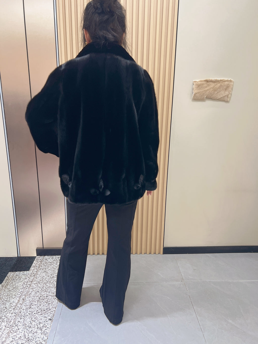 No. 217 black mink fur coat with a convertible stand-up collar.