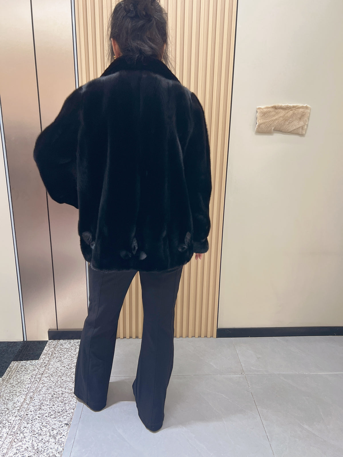 No. 217 black mink fur coat with a convertible stand-up collar.