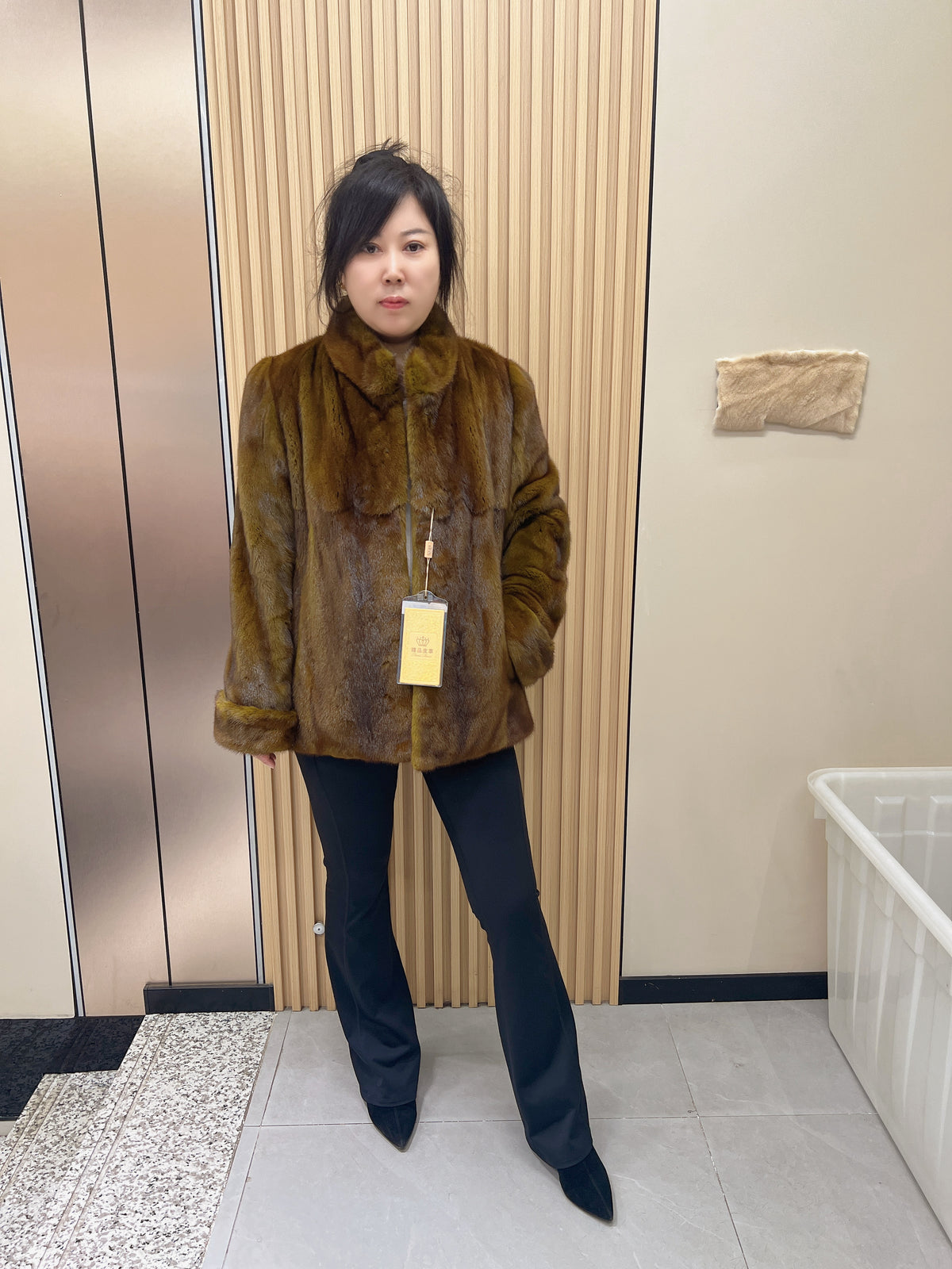 No. 240 turquoise mink fur coat featuring a stand-up collar and turn-back cuffs.