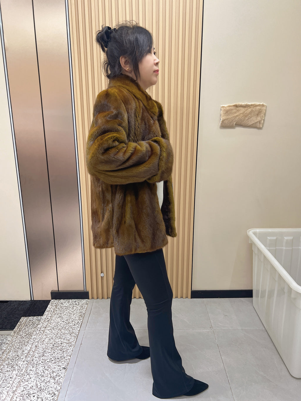 No. 240 turquoise mink fur coat featuring a stand-up collar and turn-back cuffs.