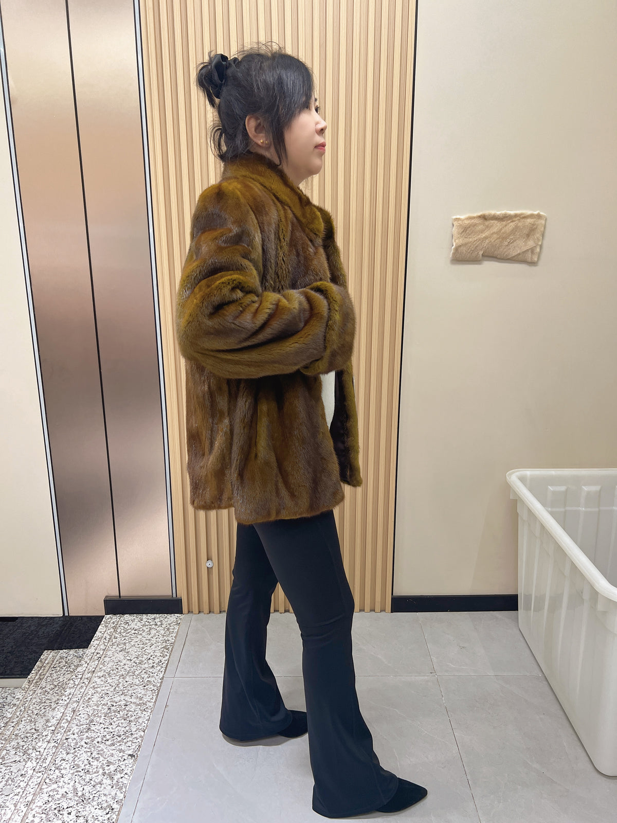 No. 240 turquoise mink fur coat featuring a stand-up collar and turn-back cuffs.
