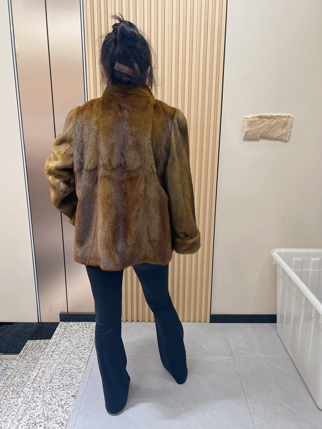 No. 240 turquoise mink fur coat featuring a stand-up collar and turn-back cuffs.