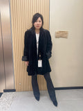 No. 209 black mink coat, mid-length, featuring a stand collar and turn-back cuffs.