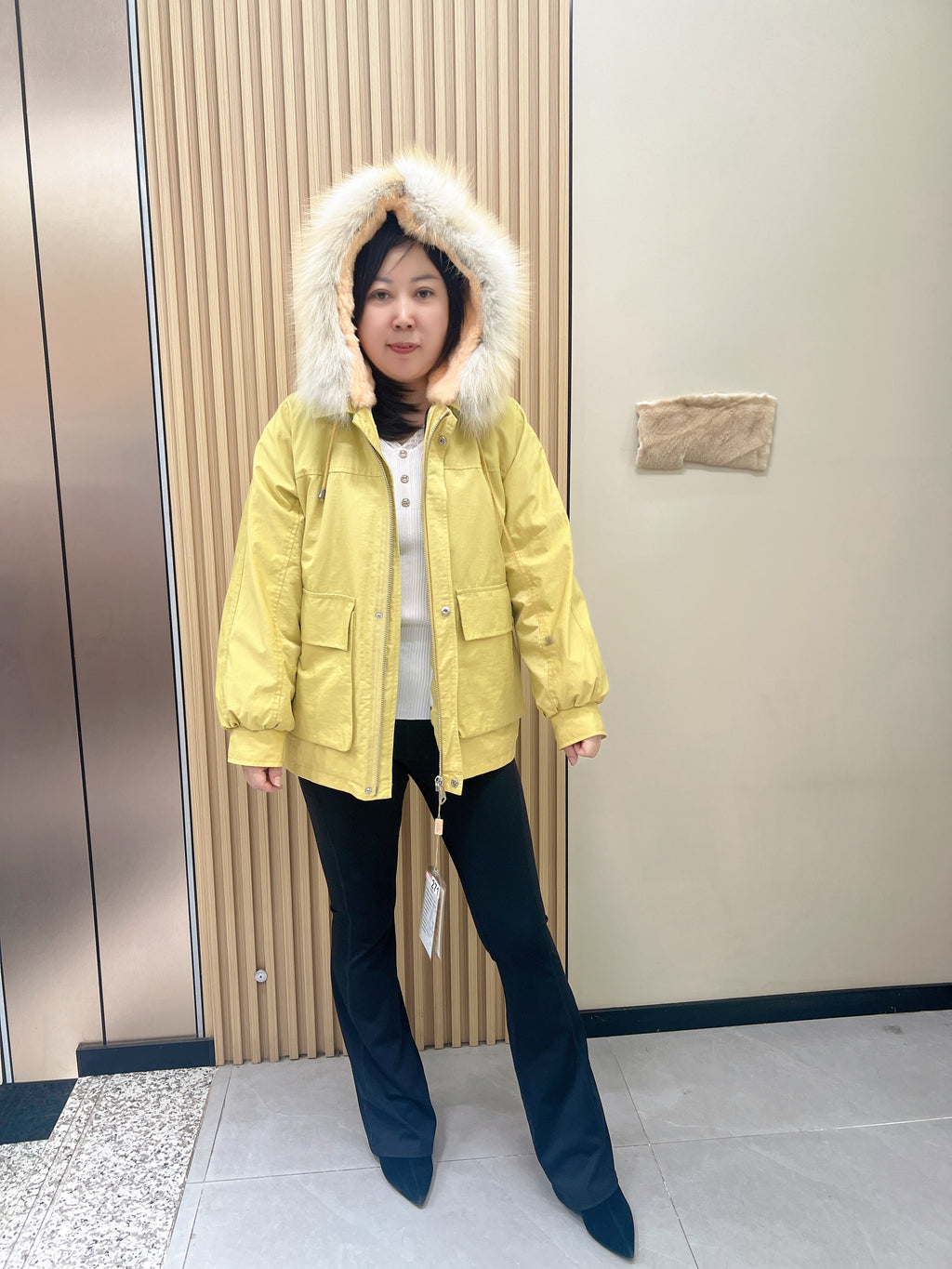 No. 271 light yellow parka, featuring a rabbit fur lining, a hood, and a fox fur collar.