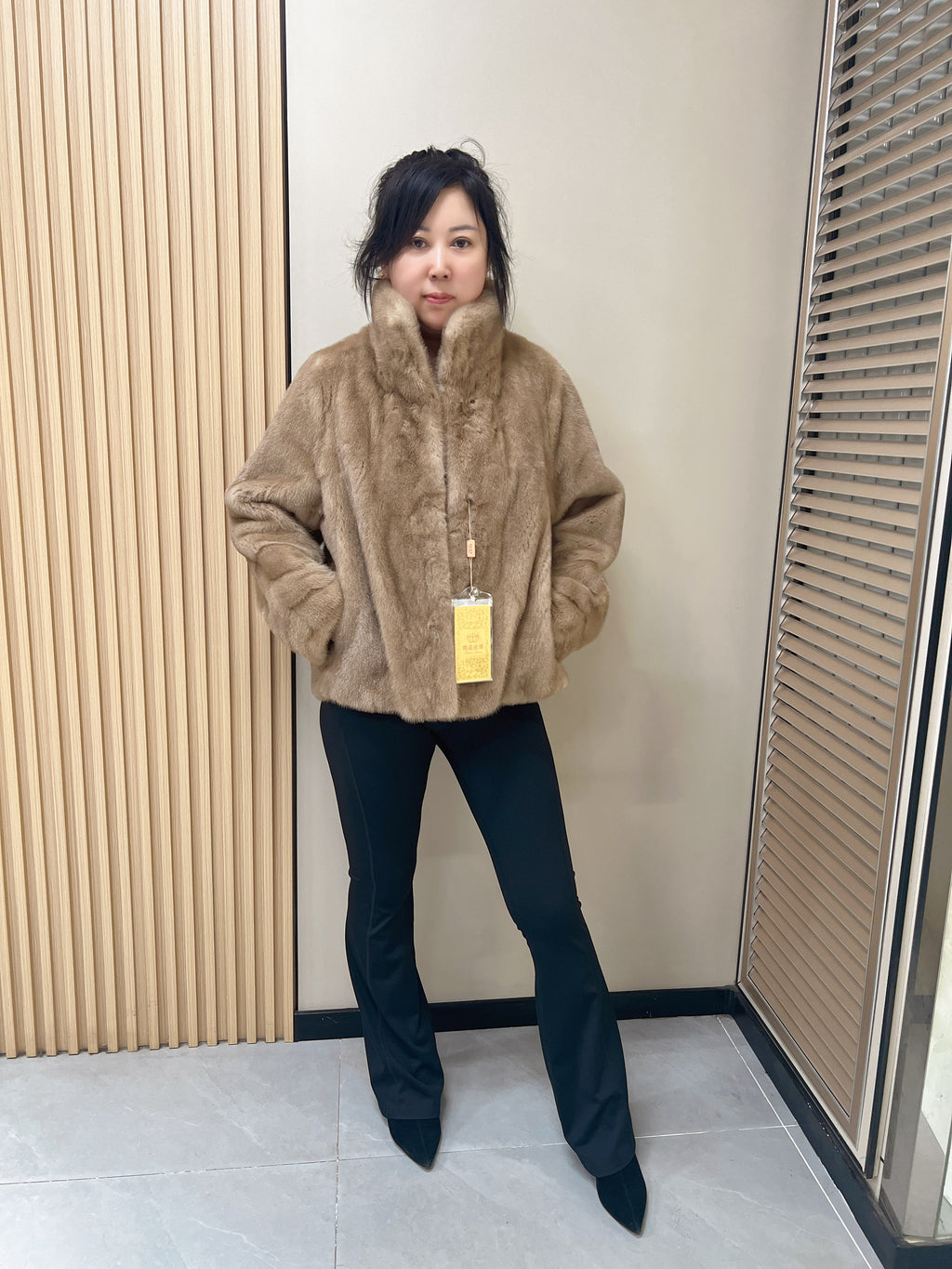 No. 315 light brown mink fur coat featuring a convertible collar (can be worn folded down or turned up).