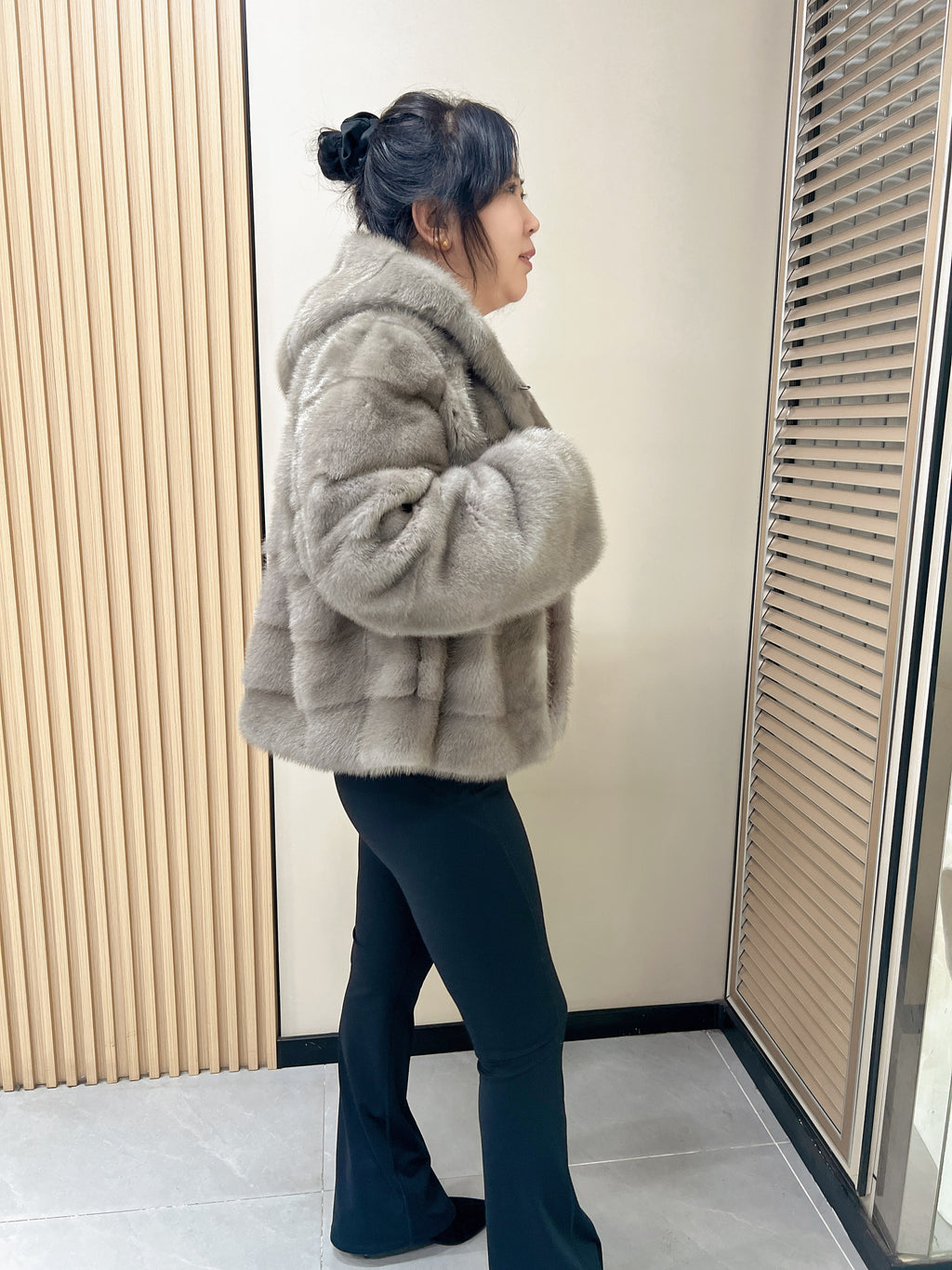 No. 314 Grey hooded mink fur coat with horizontal leather paneling.