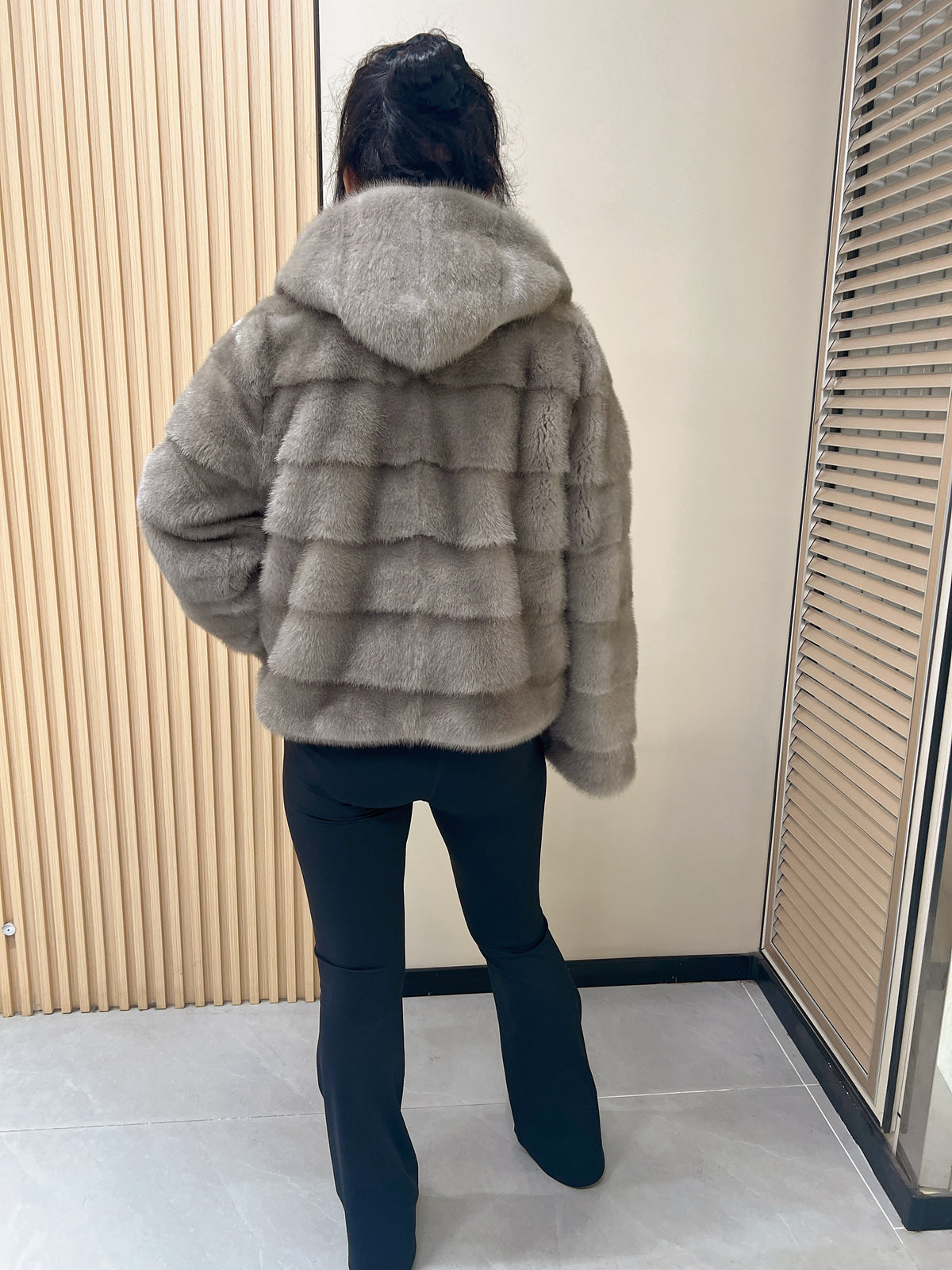 No. 314 Grey hooded mink fur coat with horizontal leather paneling.