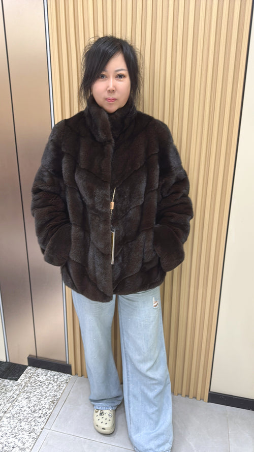 No. 006 Brown velvet-finish mink coat featuring a stand collar, diagonal buttoning, and roll-up sleeves.