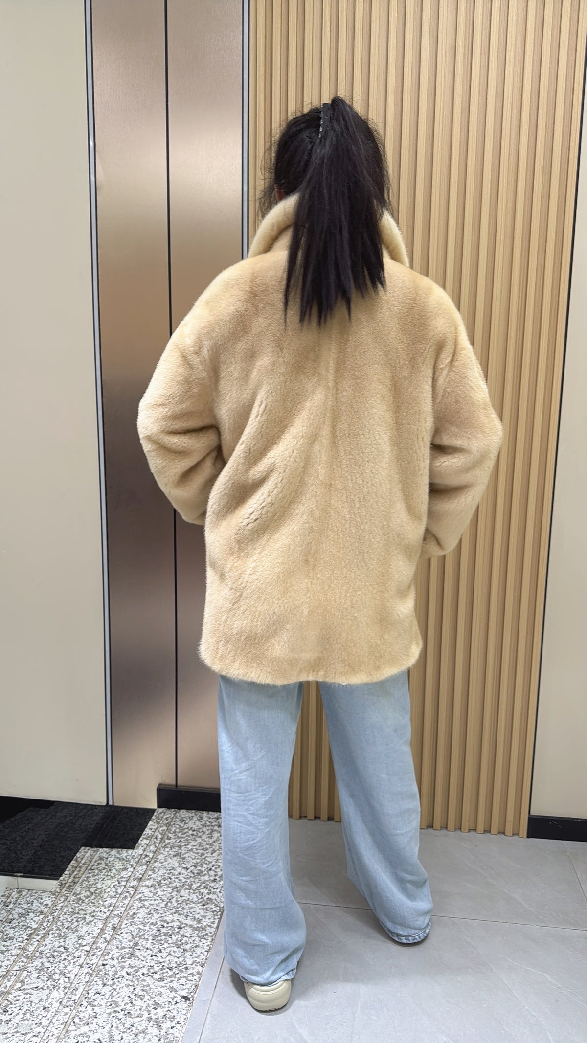 No. 009 Beige velvet-finish mink coat featuring a lapel collar, horizontal pocket flaps, and vintage-style button detailing.