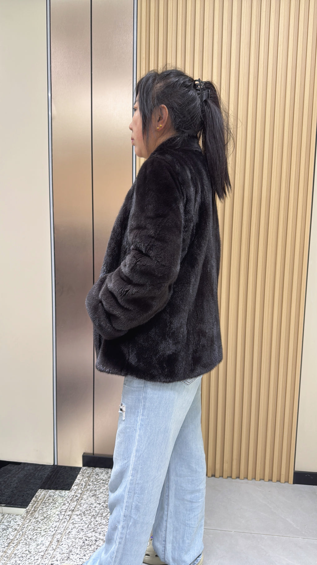 No. 010 Dark brown V-neck velvet-finish mink coat with roll-up sleeves.