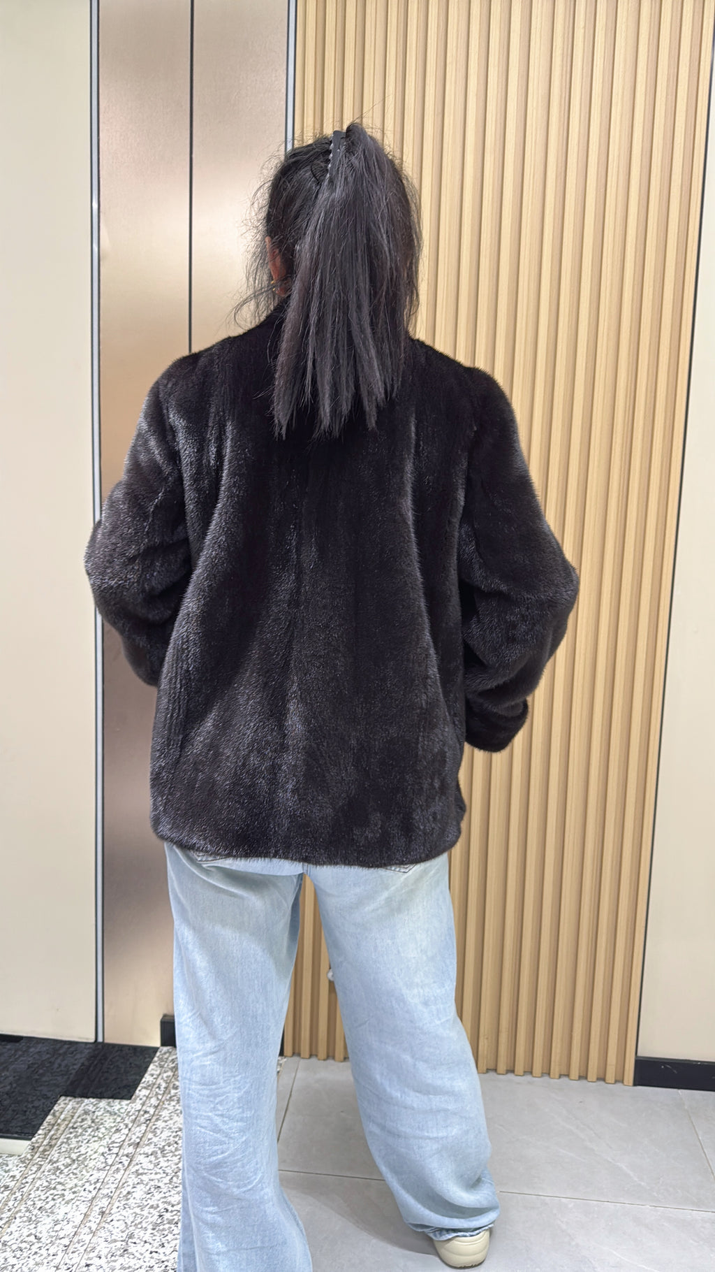 No. 010 Dark brown V-neck velvet-finish mink coat with roll-up sleeves.
