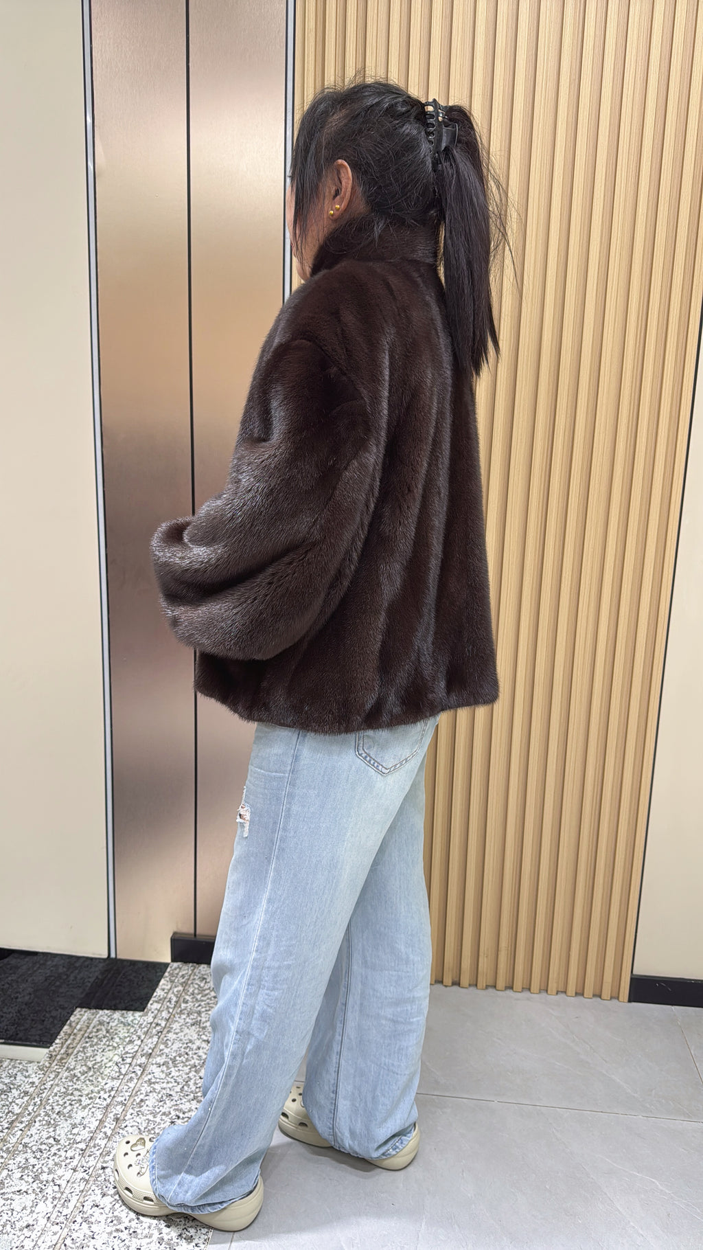 No. 012 Dark brown velvet-finish mink coat featuring a stand-up collar and fitted cuffs.