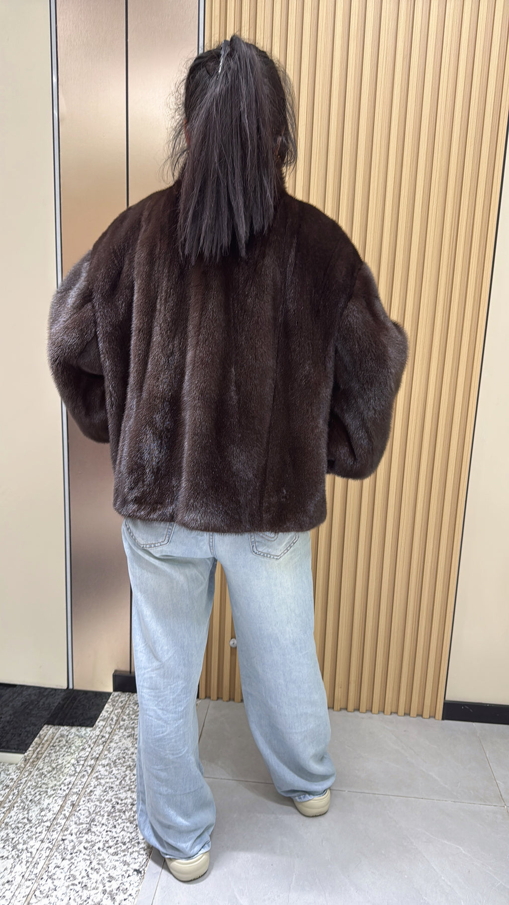No. 012 Dark brown velvet-finish mink coat featuring a stand-up collar and fitted cuffs.