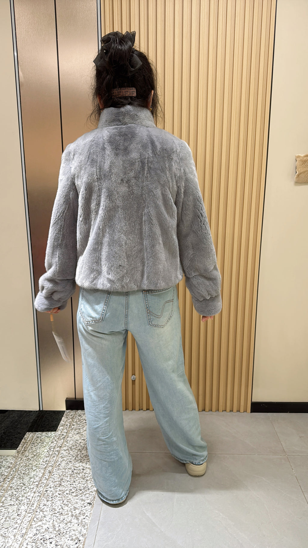 037 Grey mink fur coat featuring a stand-up collar and banded cuffs.