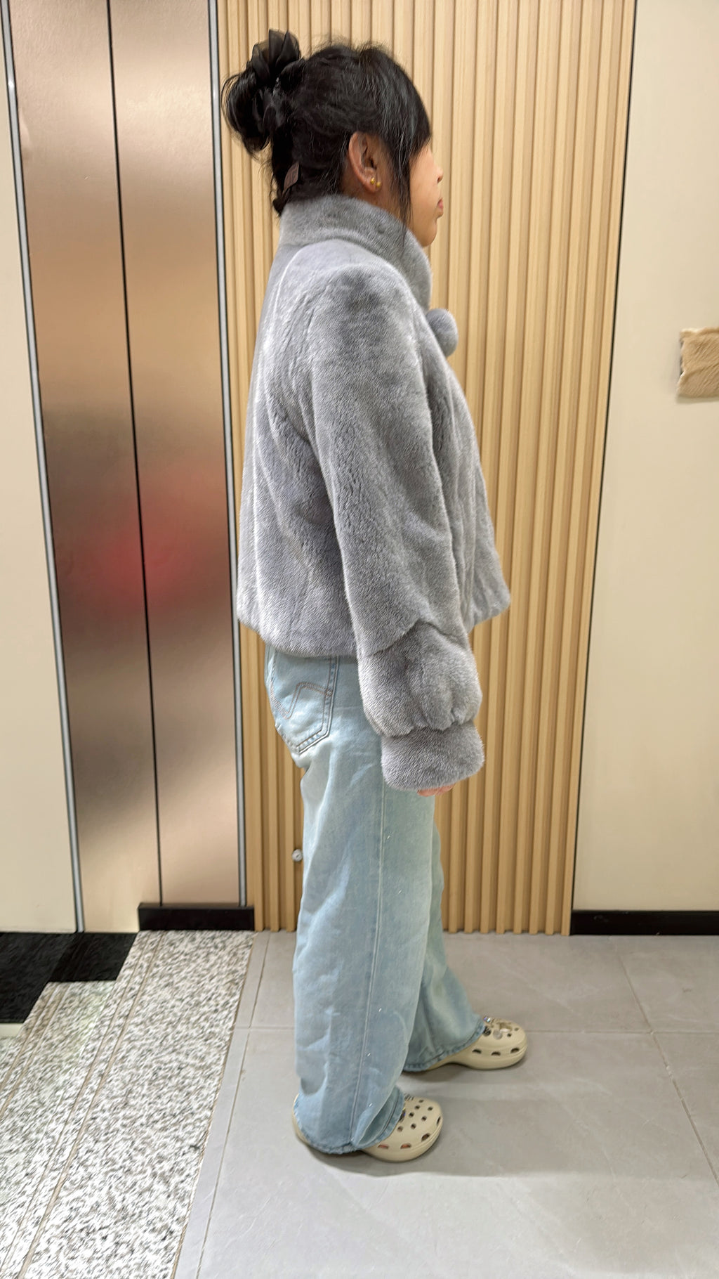 037 Grey mink fur coat featuring a stand-up collar and banded cuffs.