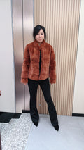 No. 044 Caramel-colored mink fur coat featuring a horizontal panel design.