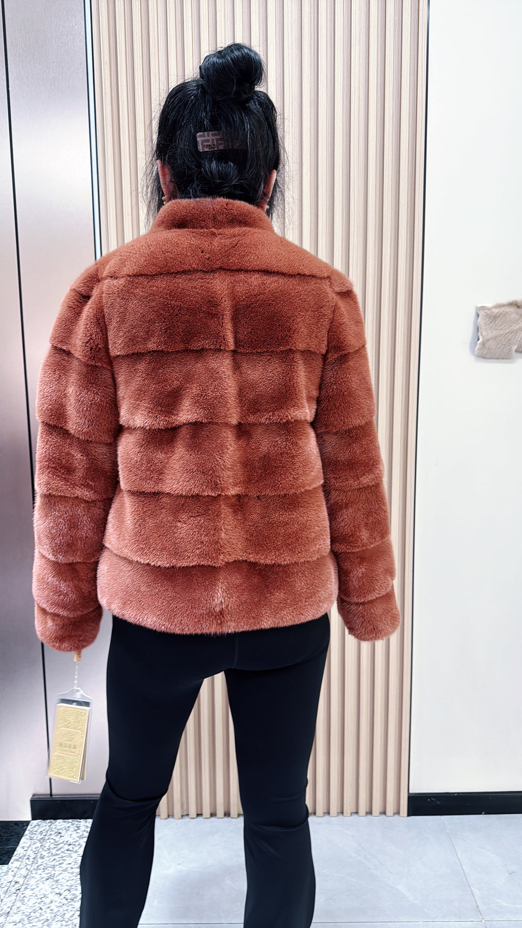 No. 044 Caramel-colored mink fur coat featuring a horizontal panel design.