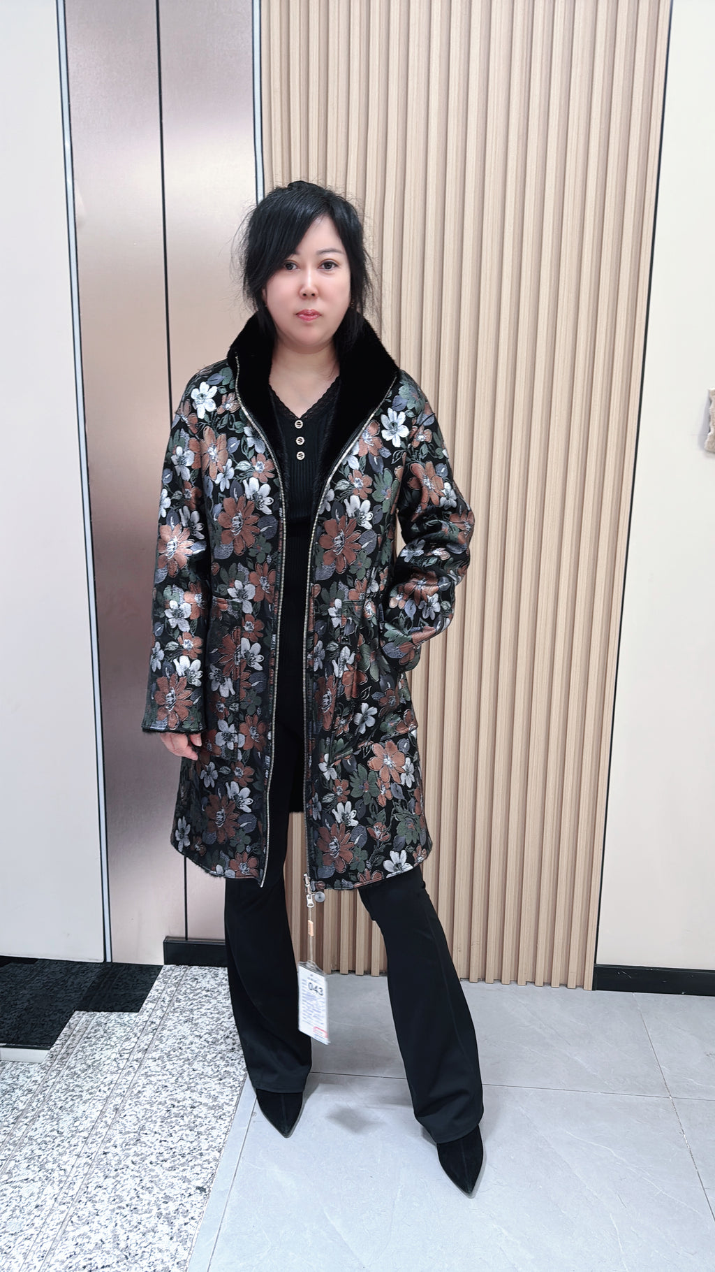 No. 043 Black reversible mink fur coat featuring a stand collar and zip closure.