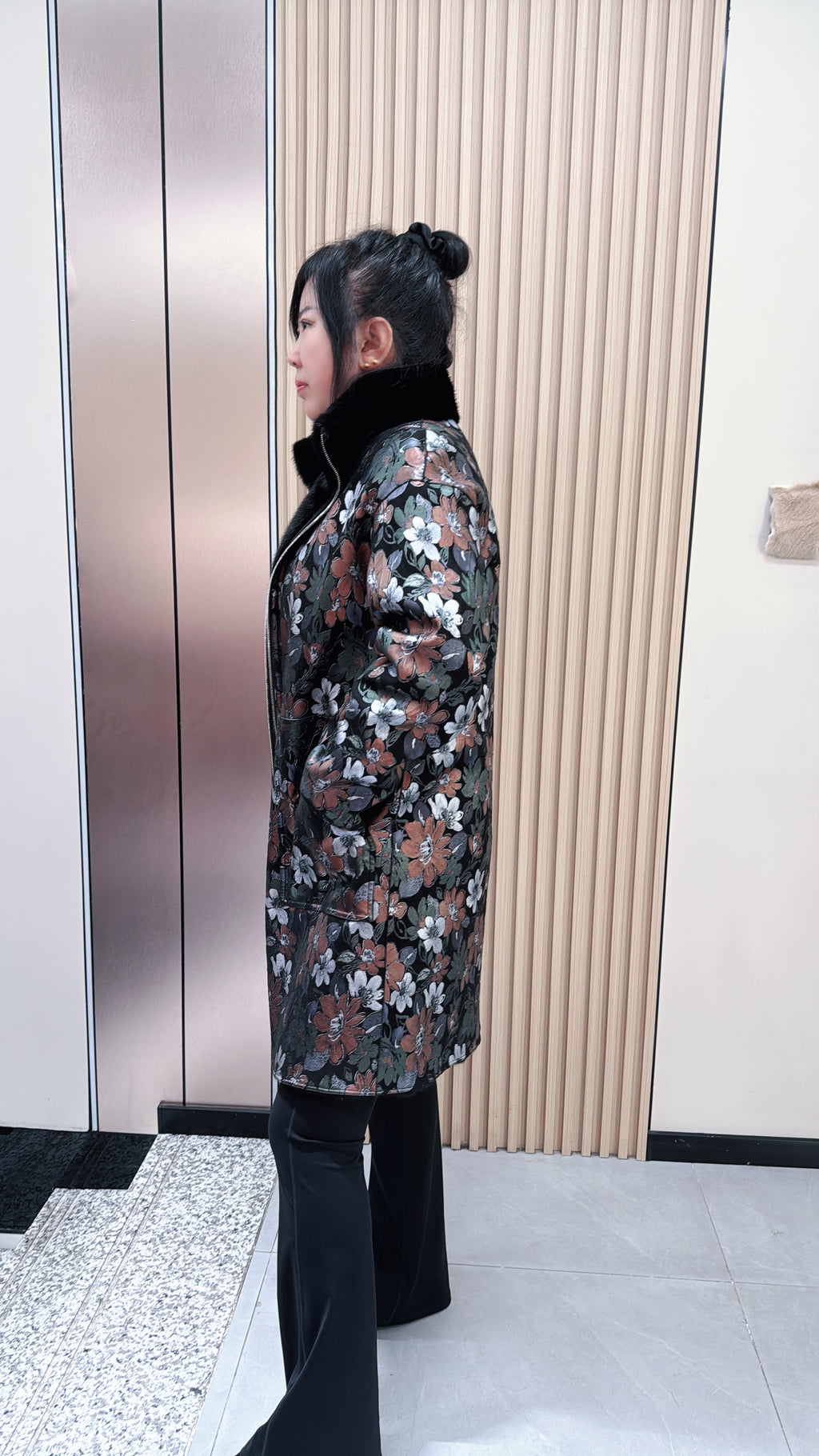 No. 043 Black reversible mink fur coat featuring a stand collar and zip closure.