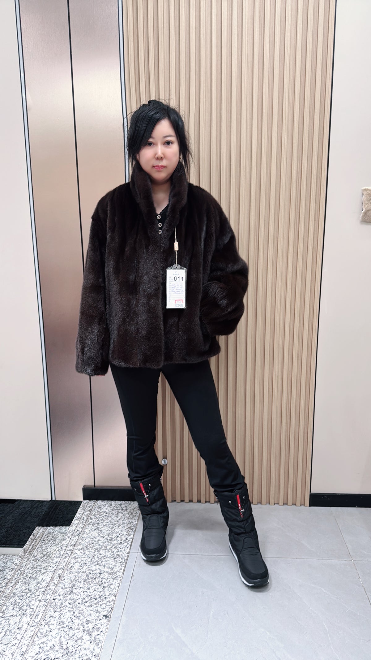 No. 011 Dark brown velvet-finish mink coat featuring a stand-up collar and fitted cuffs.