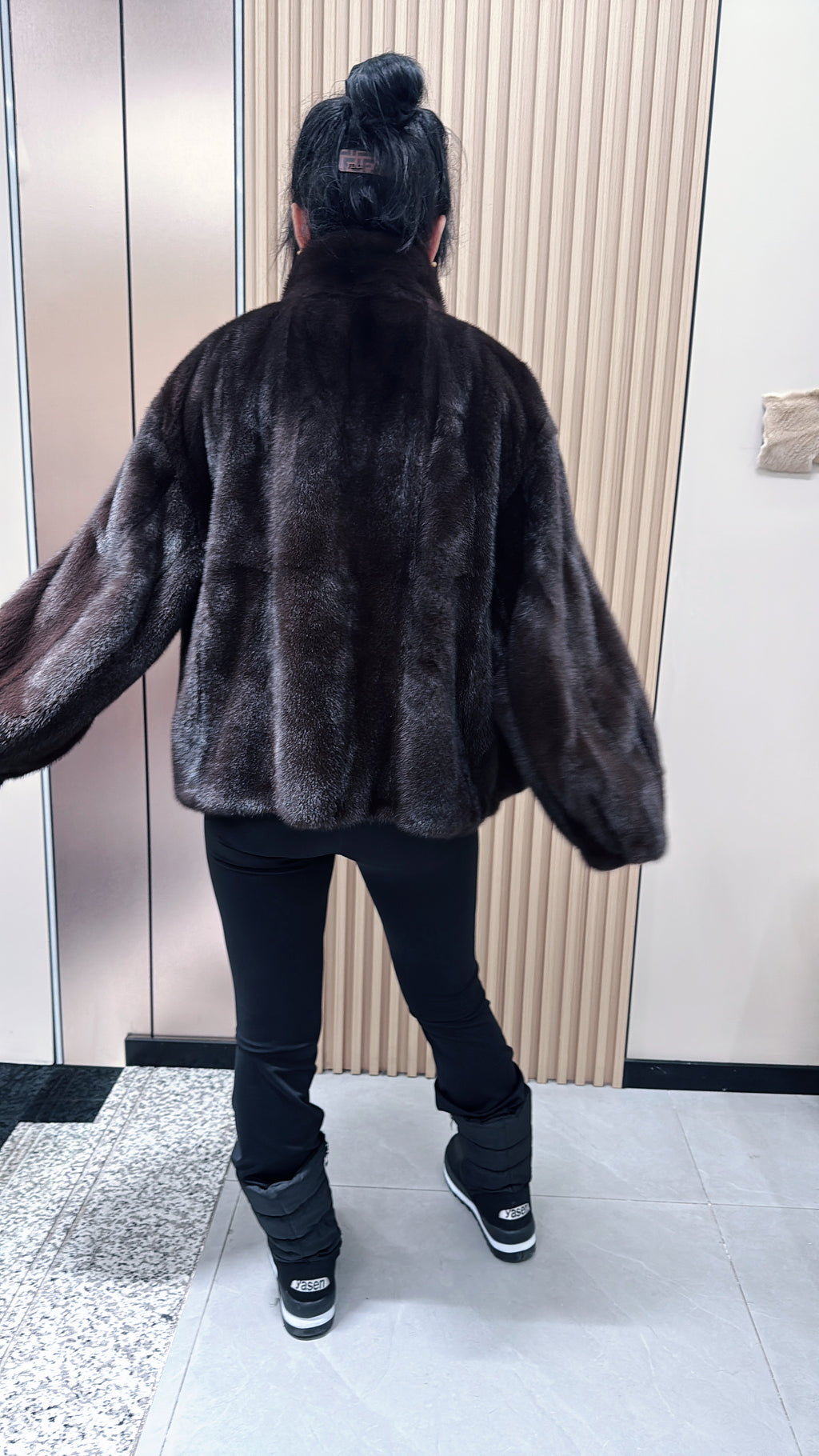 No. 011 Dark brown velvet-finish mink coat featuring a stand-up collar and fitted cuffs.