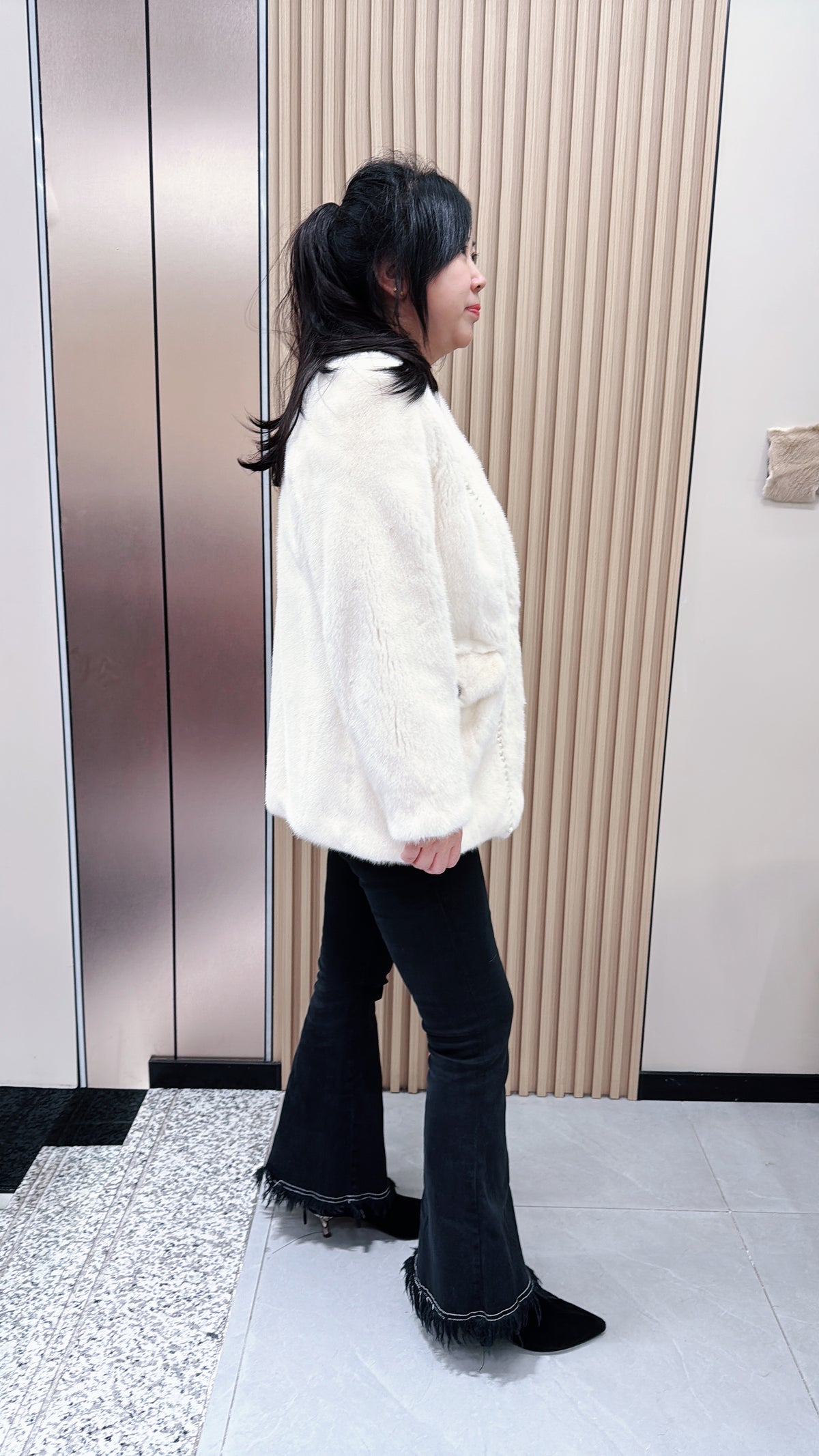 No. 079 White V-neck mink fur coat—Chanel style, accented with pearl details.