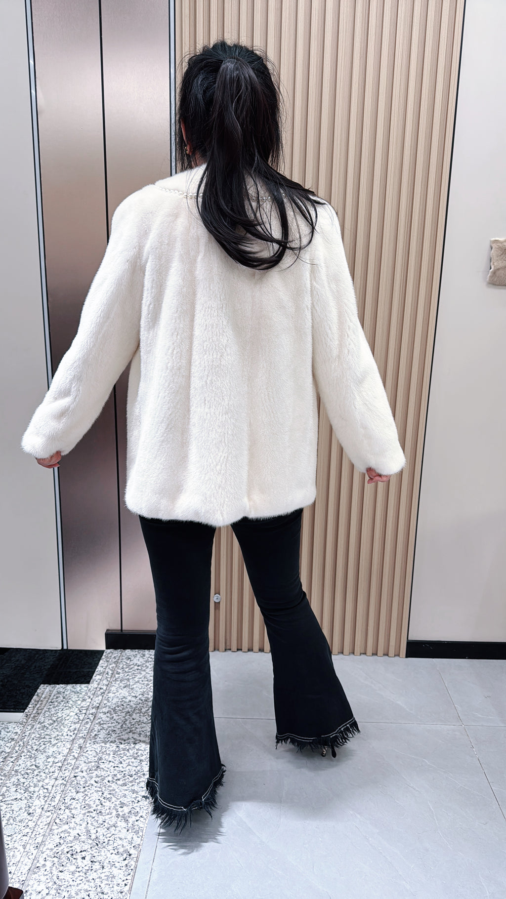 No. 079 White V-neck mink fur coat—Chanel style, accented with pearl details.