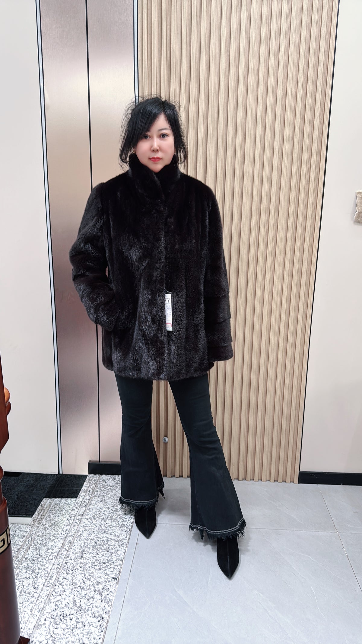 No. 077 Dark brown mink fur coat with convertible stand/fold-down collar.