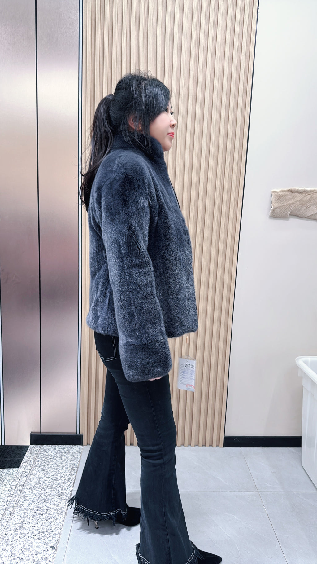 No. 072 Dark grey mink fur coat featuring a stand collar and zip closure.