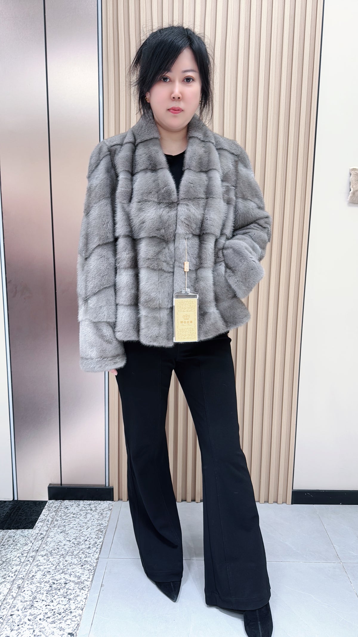 No. 096 Grey V-neck mink fur coat featuring a horizontal panel design.