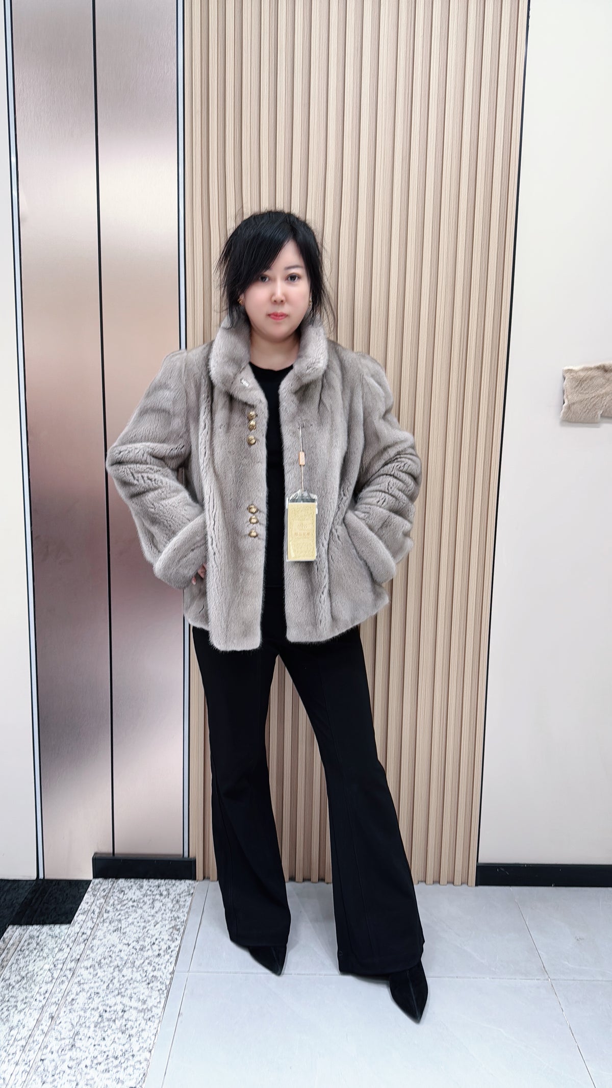 No. 097 Silver-blue mink fur coat, featuring a stand-up collar and turn-back cuffs accented with bronze-colored buttons.