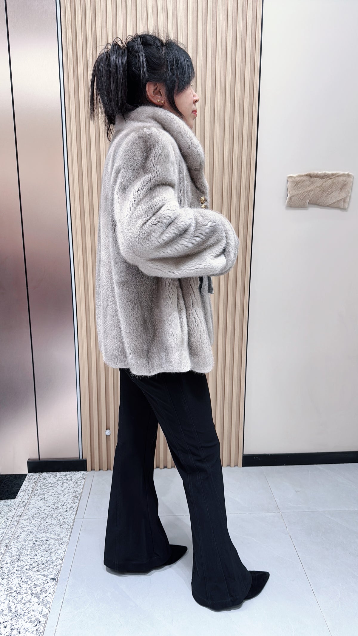 No. 097 Silver-blue mink fur coat, featuring a stand-up collar and turn-back cuffs accented with bronze-colored buttons.