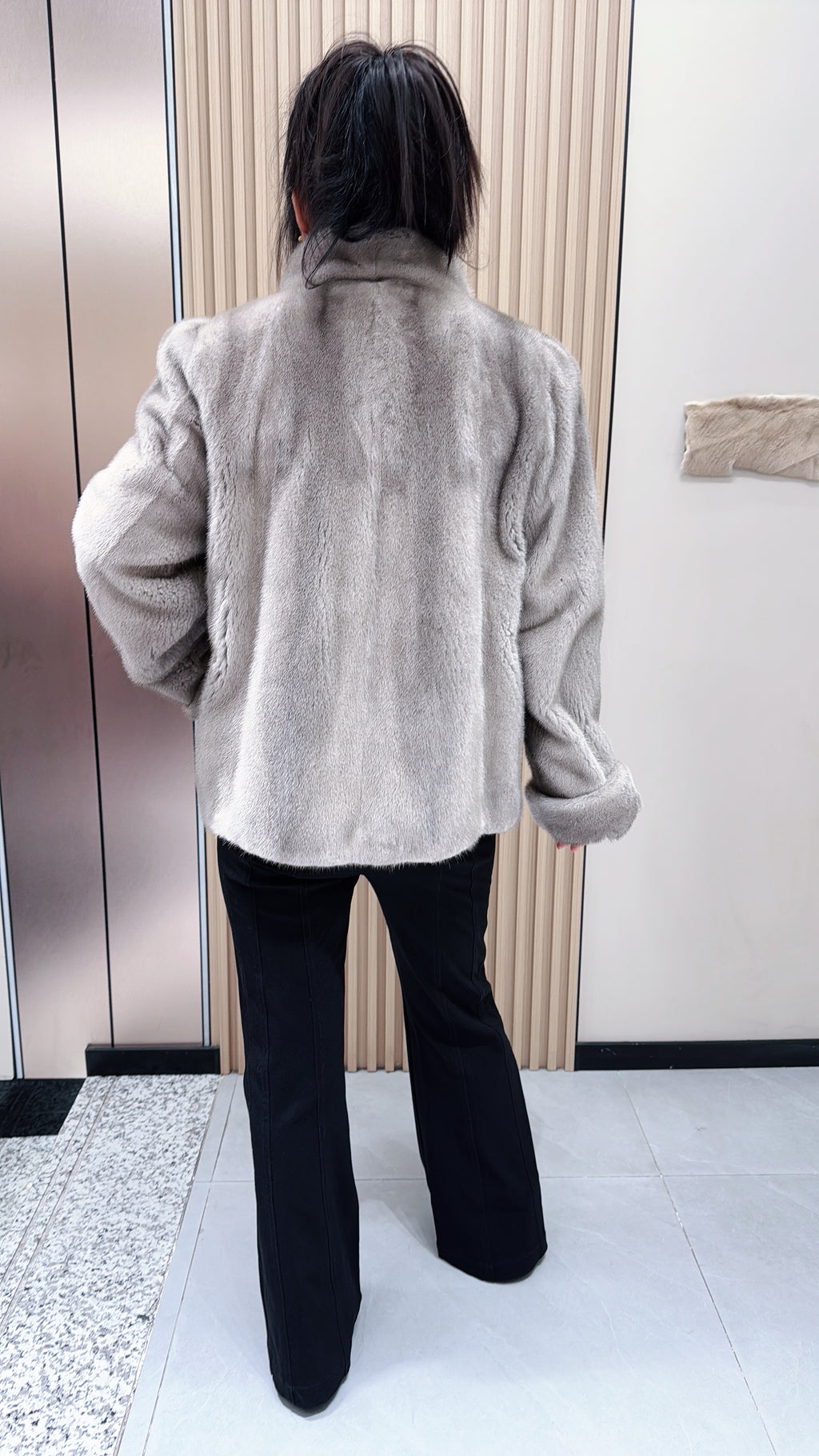 No. 097 Silver-blue mink fur coat, featuring a stand-up collar and turn-back cuffs accented with bronze-colored buttons.
